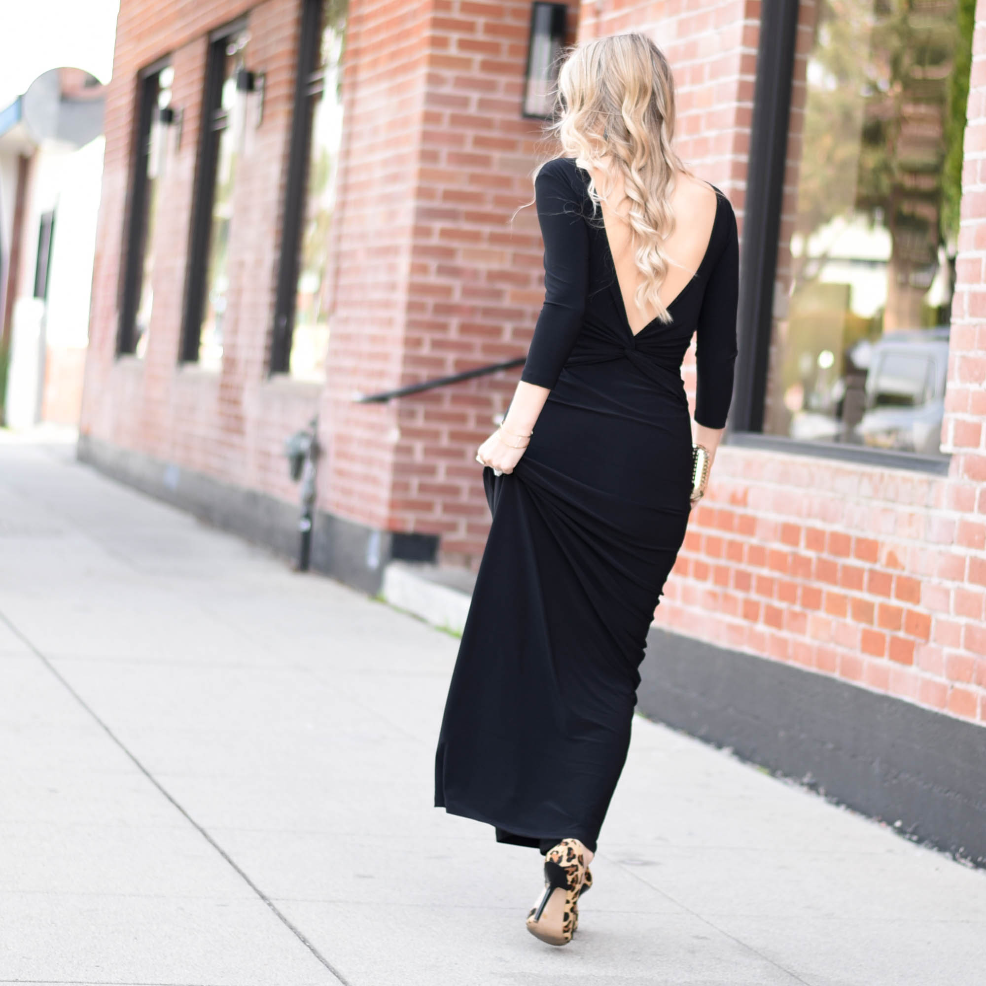 a deep v backless black dress