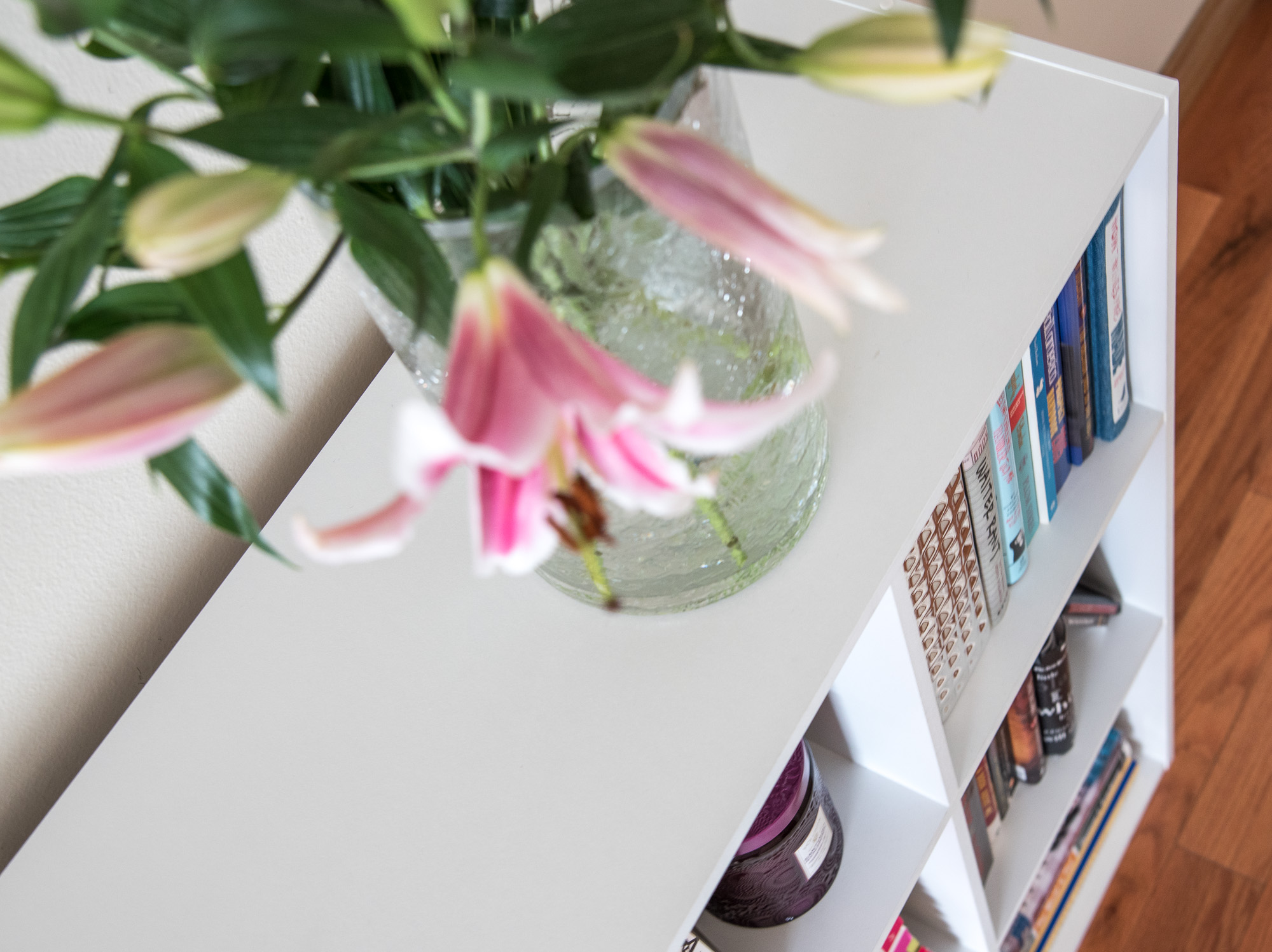 oriental lilies in a tall vase