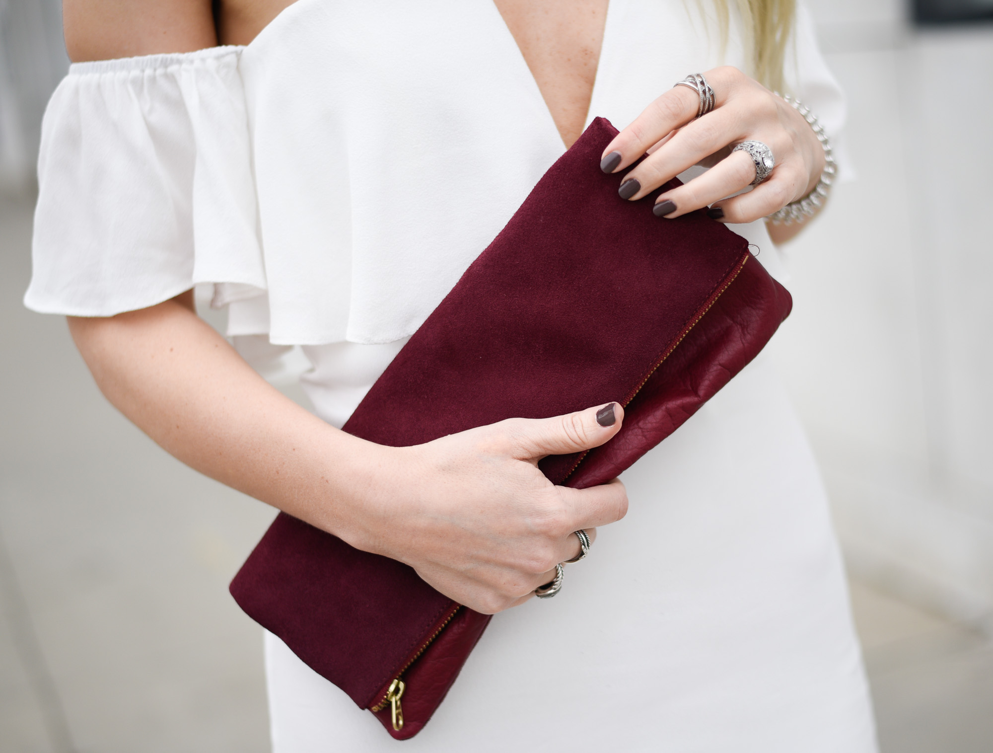 leather and suede burgundy fold over clutch 