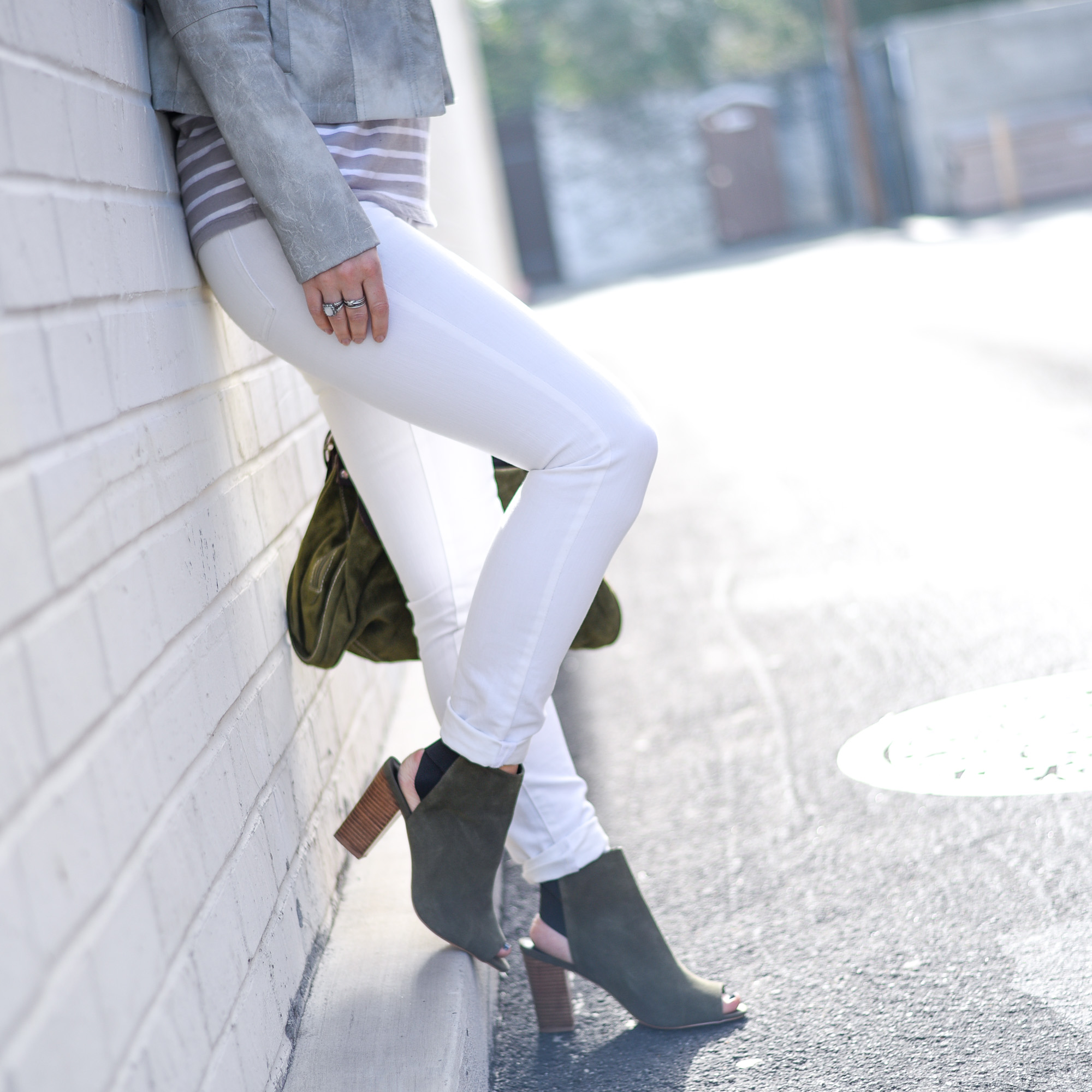 green open toe suede booties with white skinny jeans 