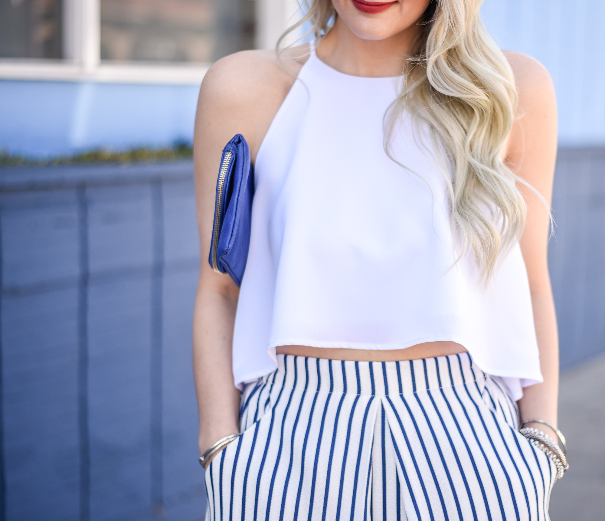 white crop top with a ruffle hem 