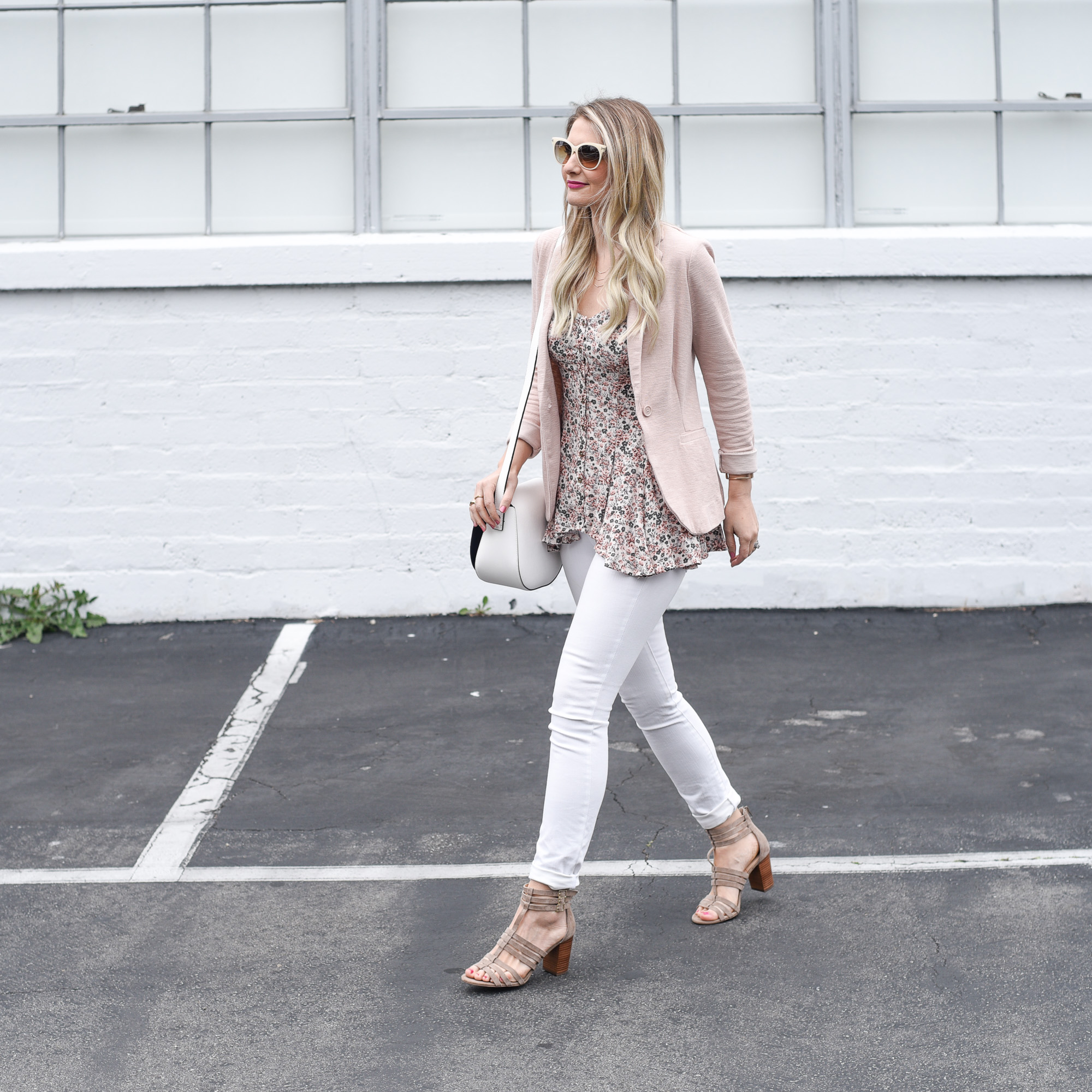 Visions of Vogue wearing a blush blazer and the Jenna bustier top. 