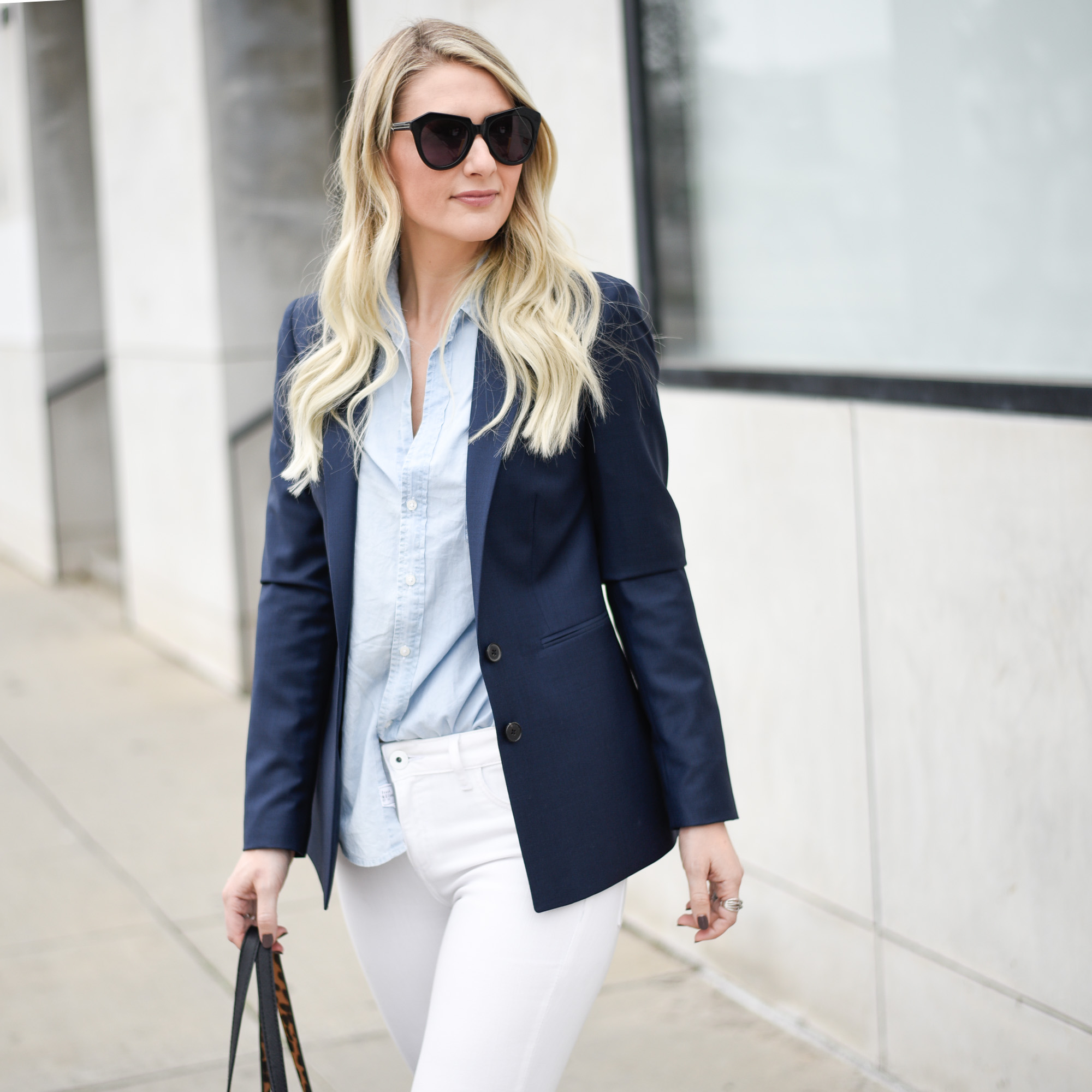 Navy blue blazer with a light blue button down top