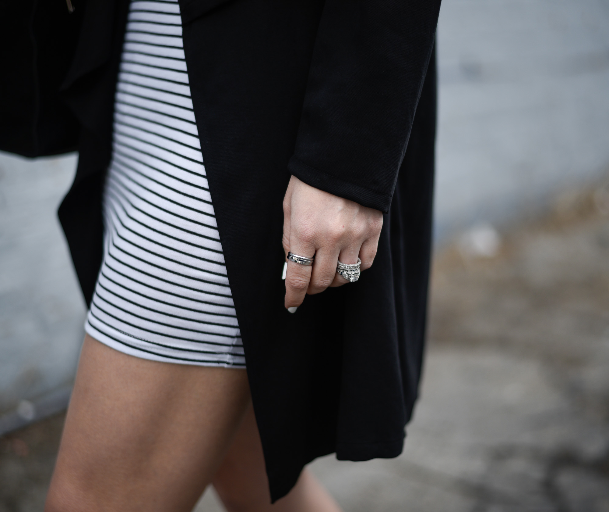 Simple silver ring stack and an antique wedding ring. 