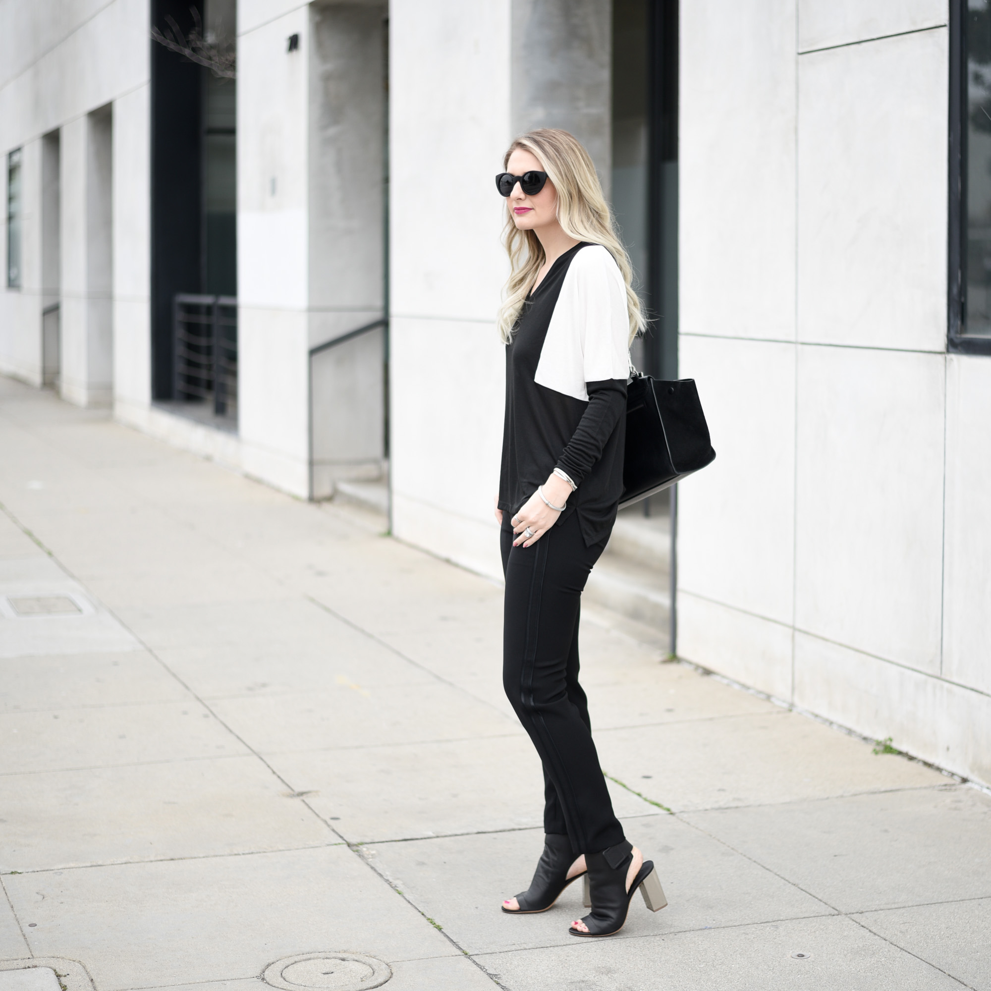 Jenna Colgrove in head to toe black and white for a monochromatic look. 