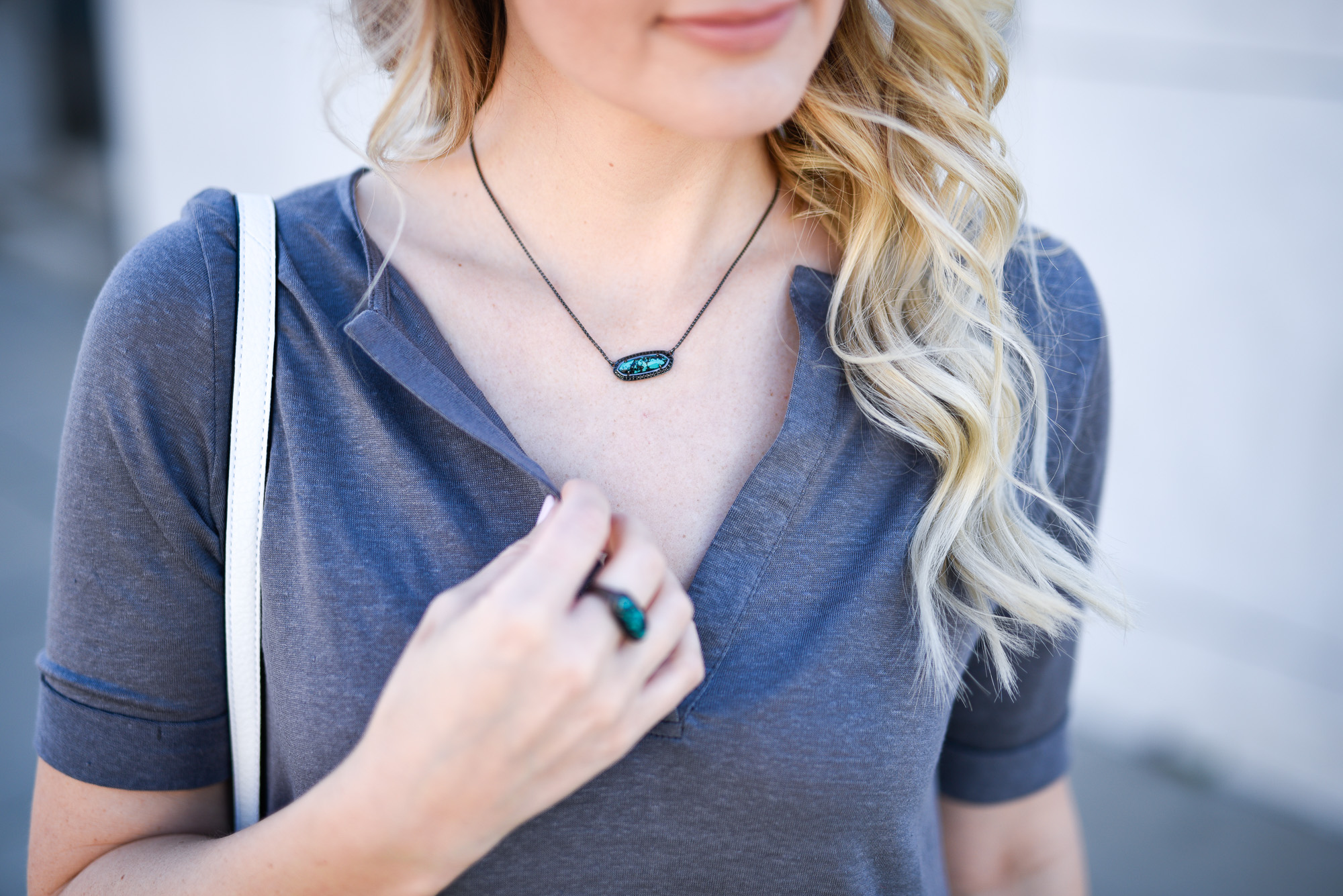Turquoise and gunmetal statement jewelry pieces. 