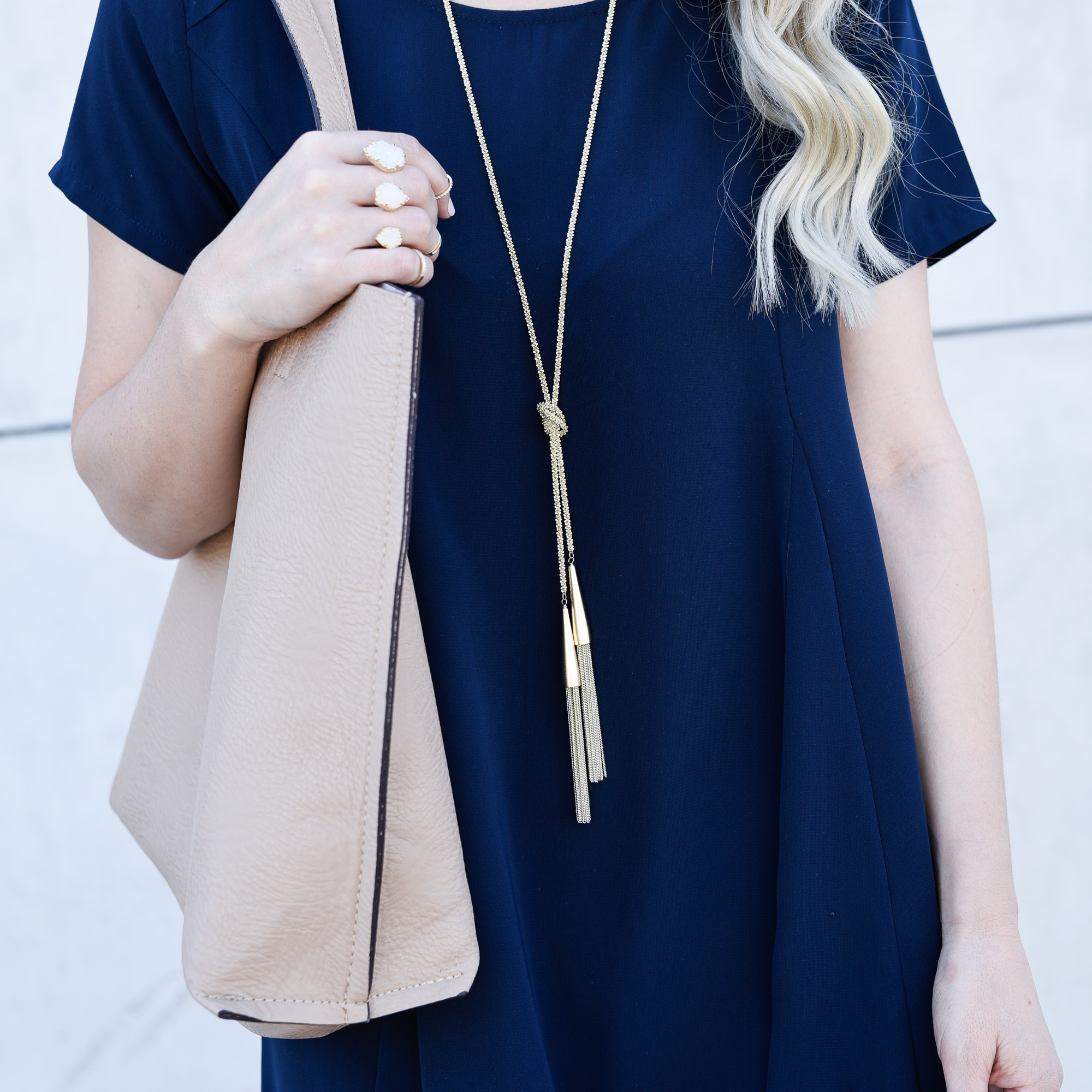 A tan beige reversible tote for summer beach days.