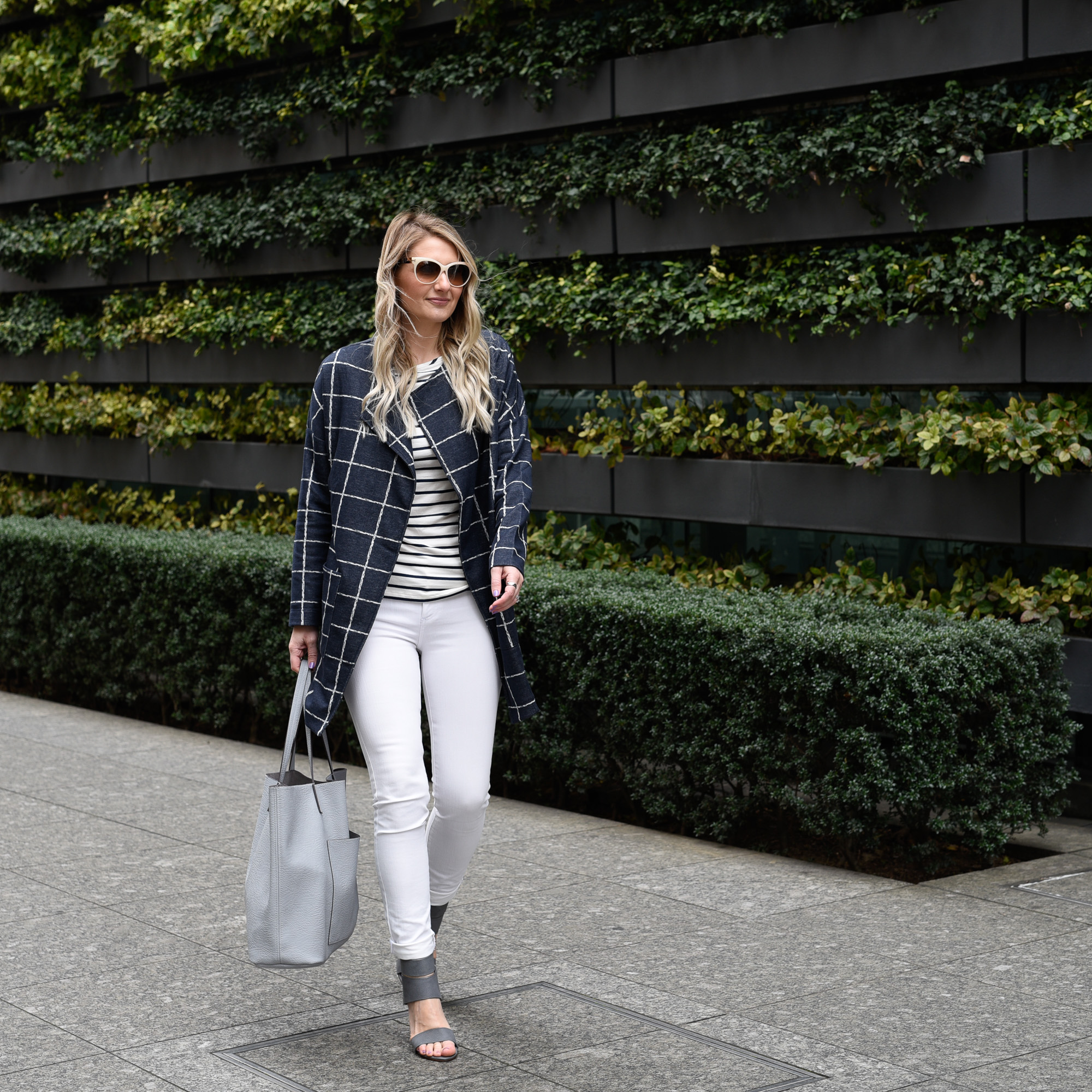 A striped long sleeve tee with a blue oversized jacket 