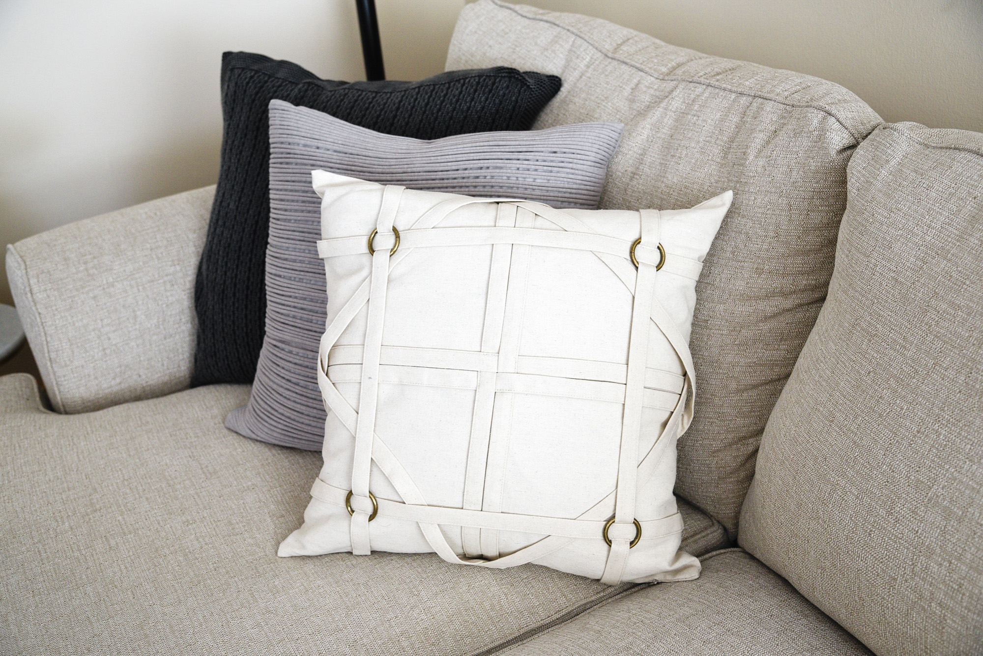 white buckle pillow 