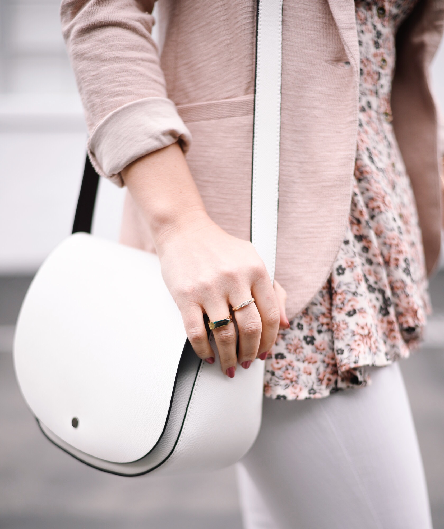 White saddle back and a floral peplum crossback top 