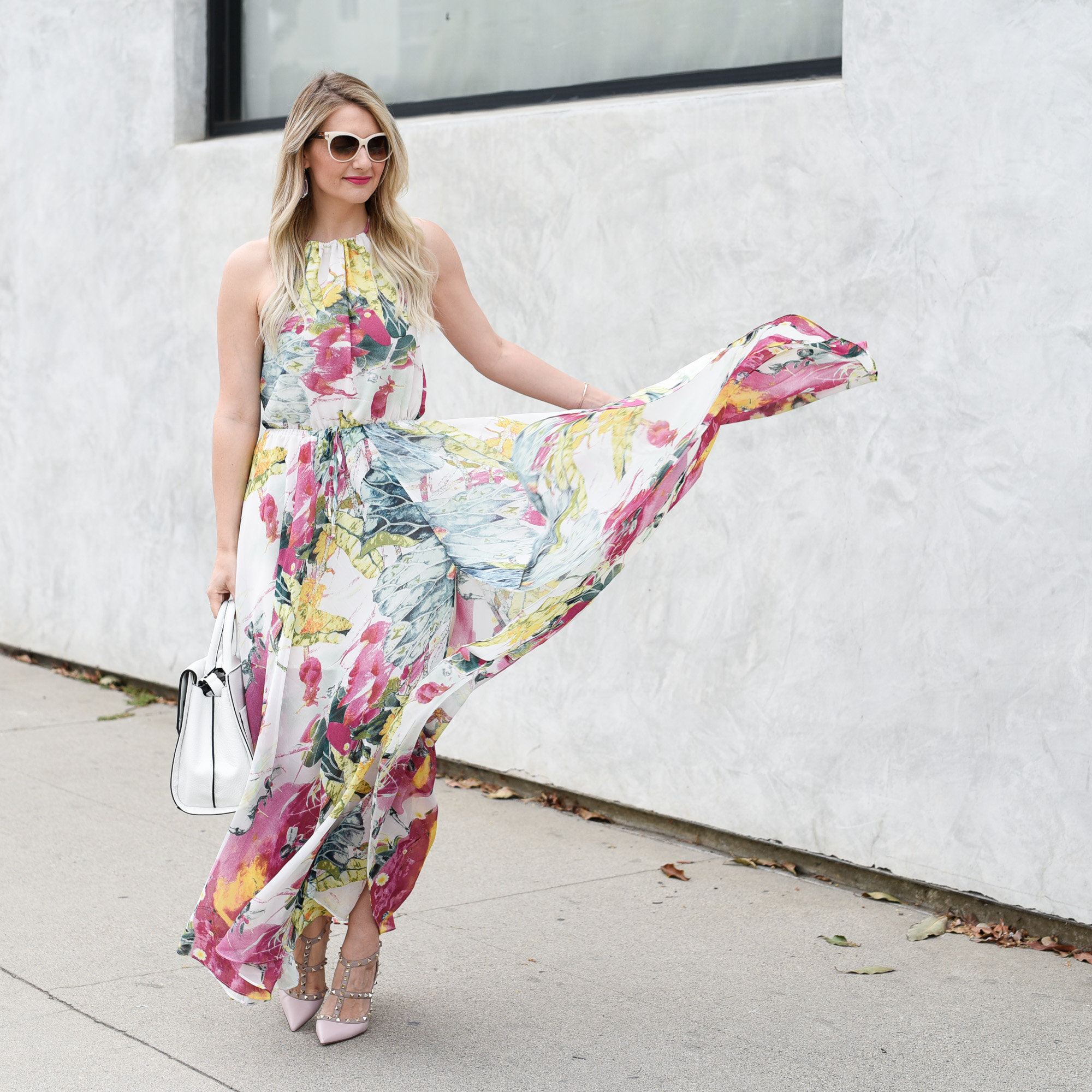 A pastel floral maxi dress with high neck. 