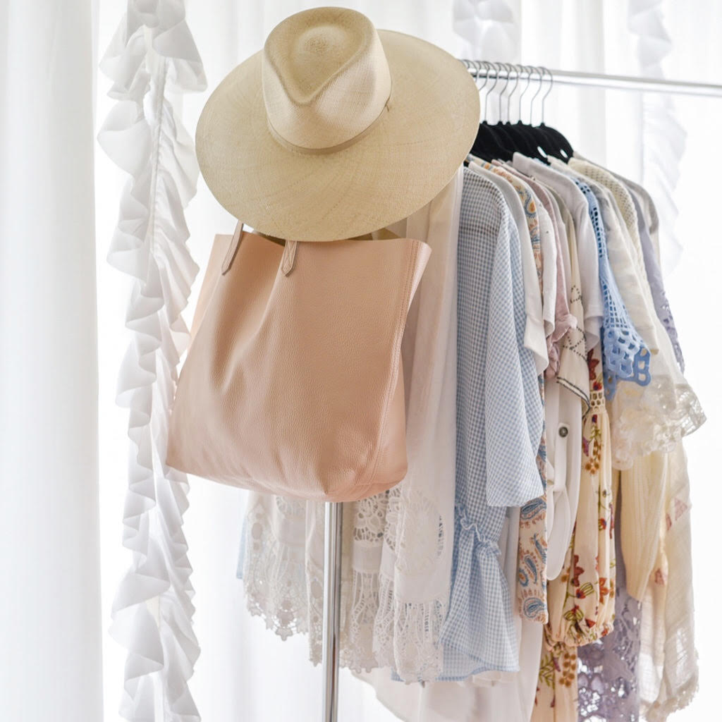 Freshly cleaned clothes on a hanging rack