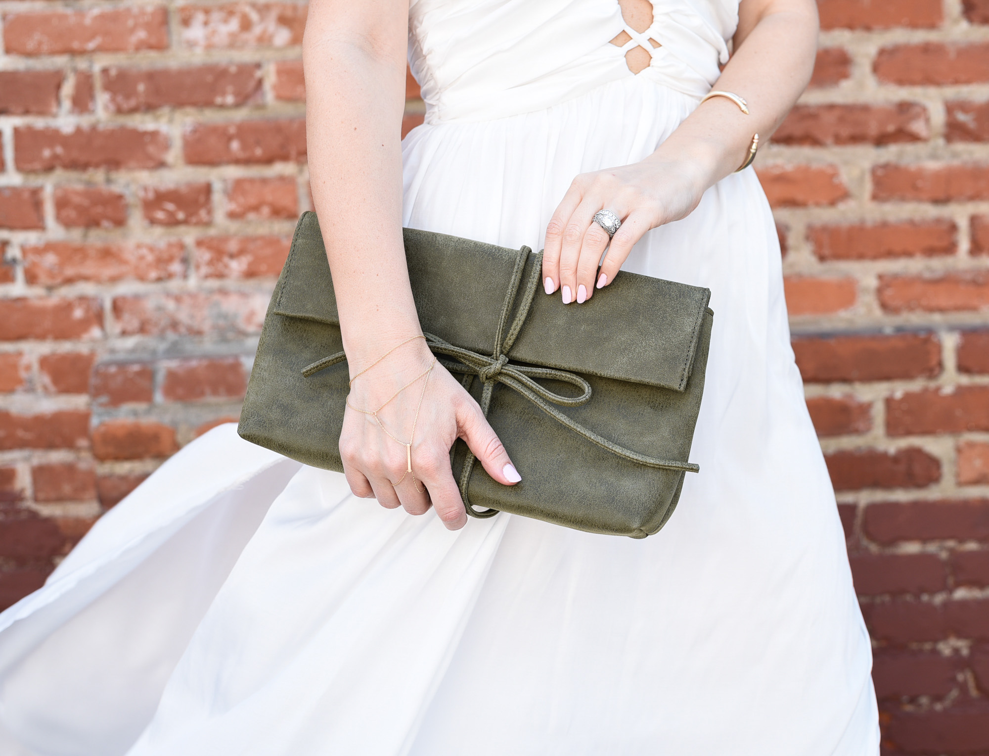 Olive green suede clutch.