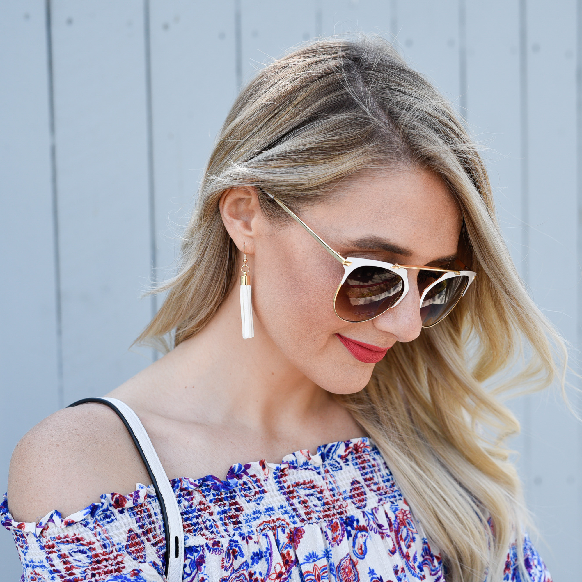 White tassel earrings and wire frame sunnies! 