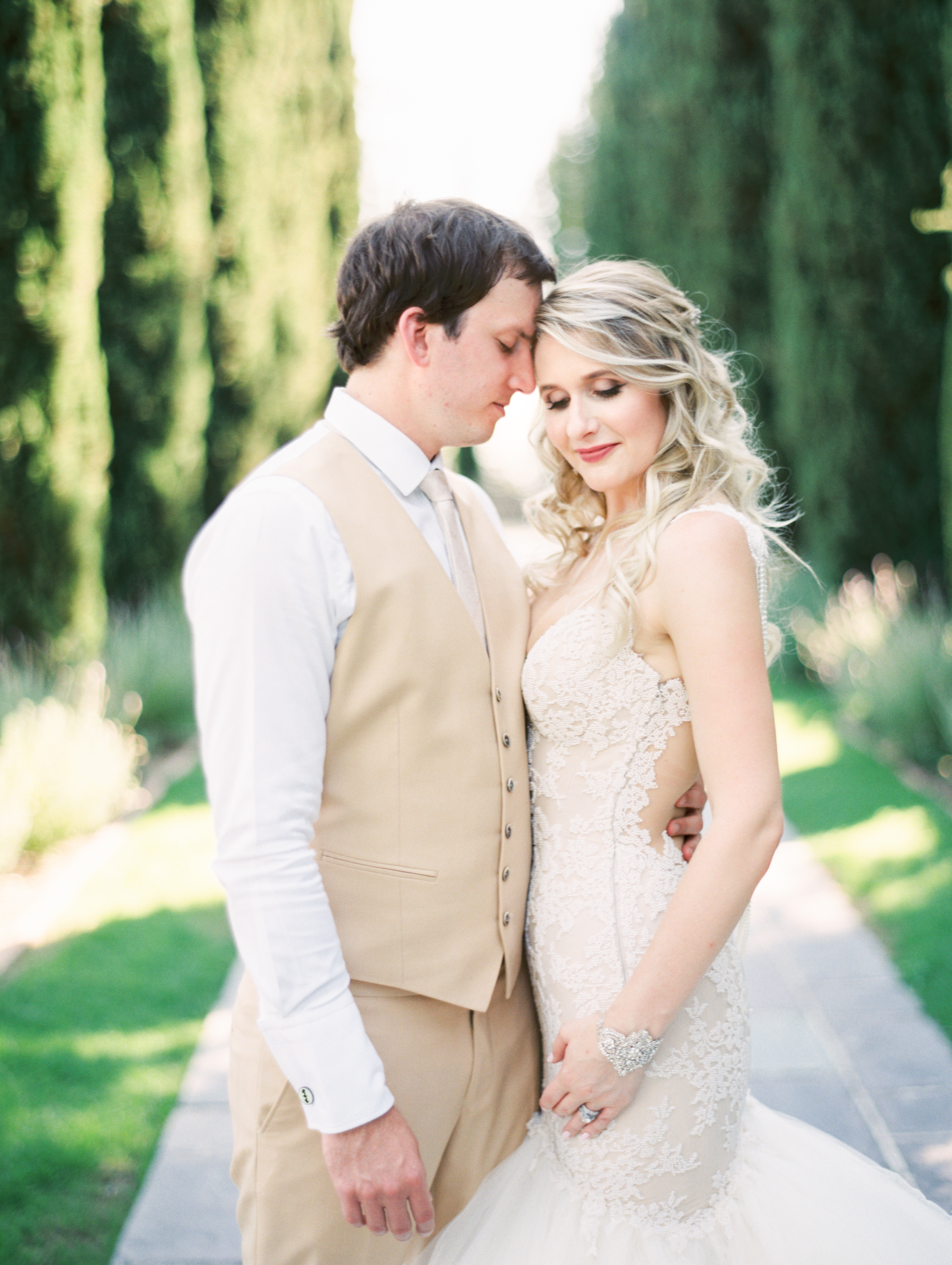 Sexy wedding dress and groom in a vest. 