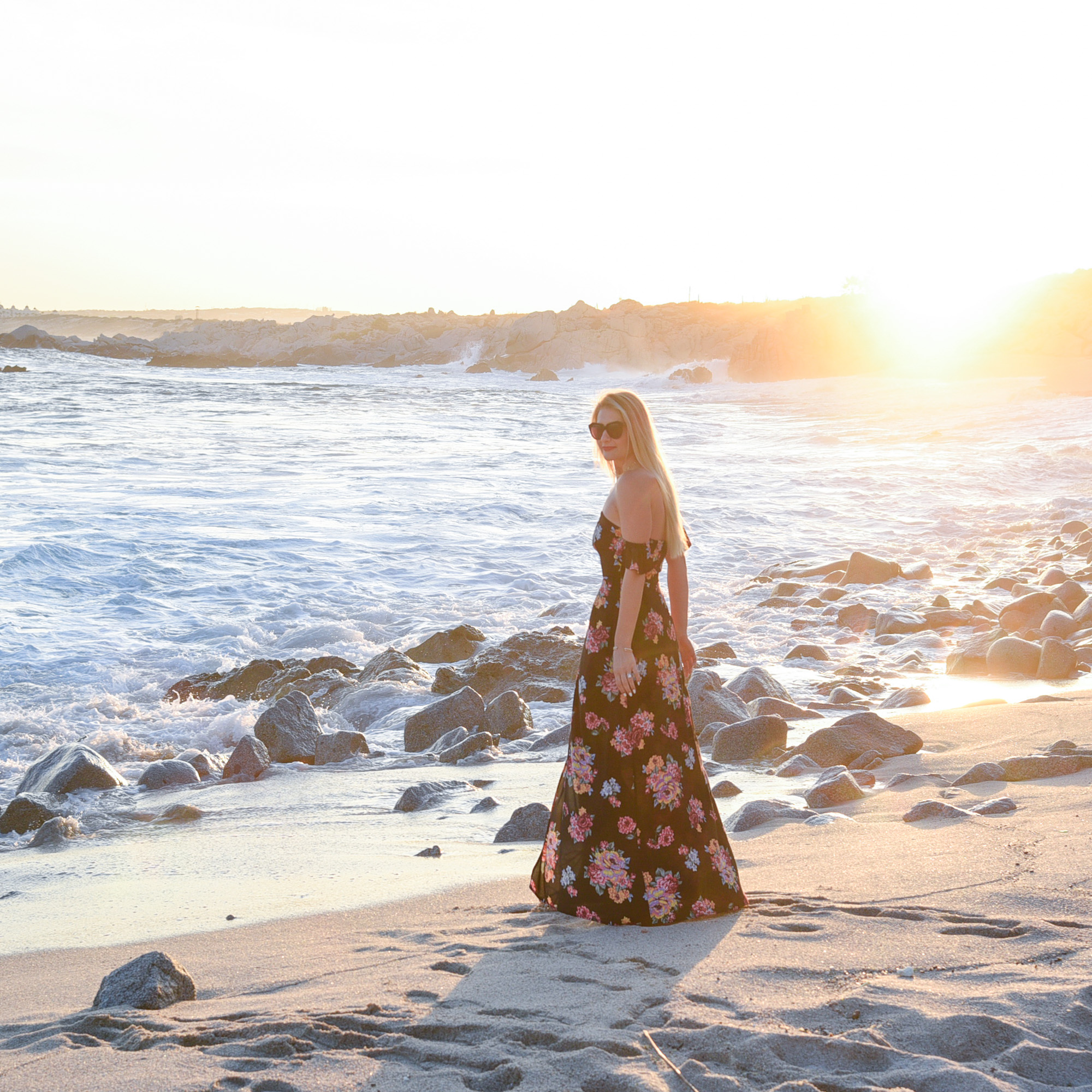 Floral maxi dress at sunset on the beach. 