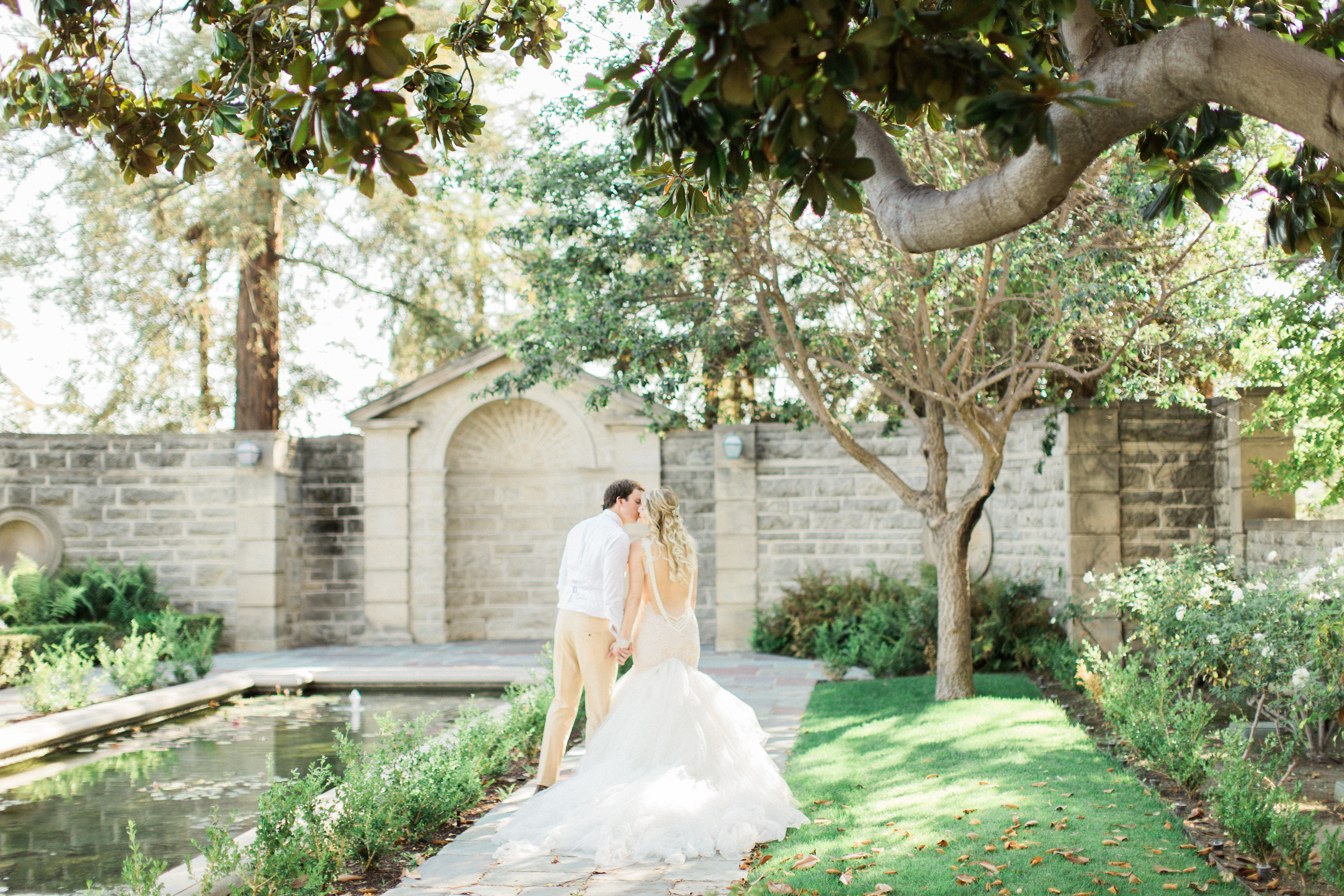 Stealing kisses by the pond at Greystone Mansion! 