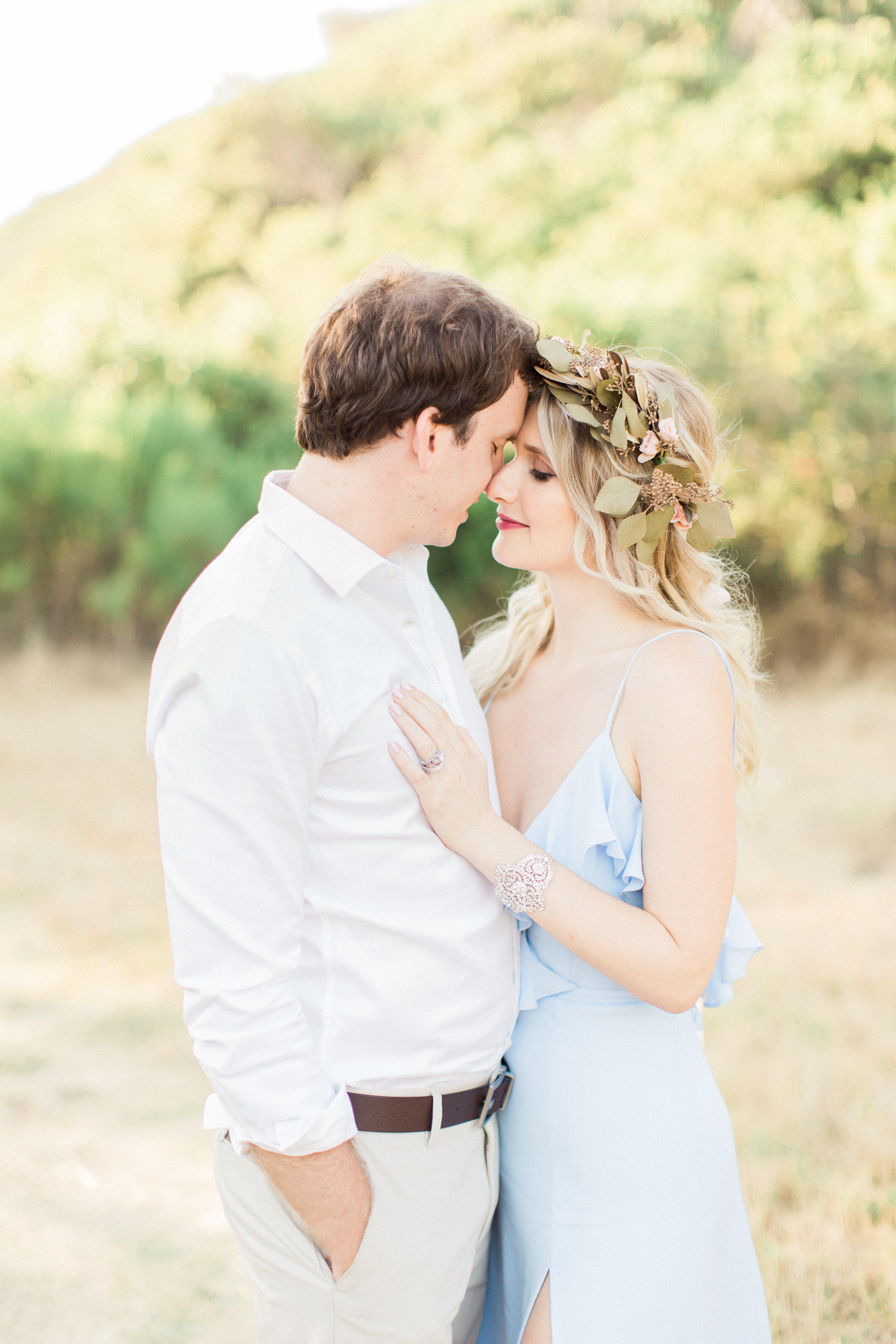 Couple in a dreamy garden setting. 