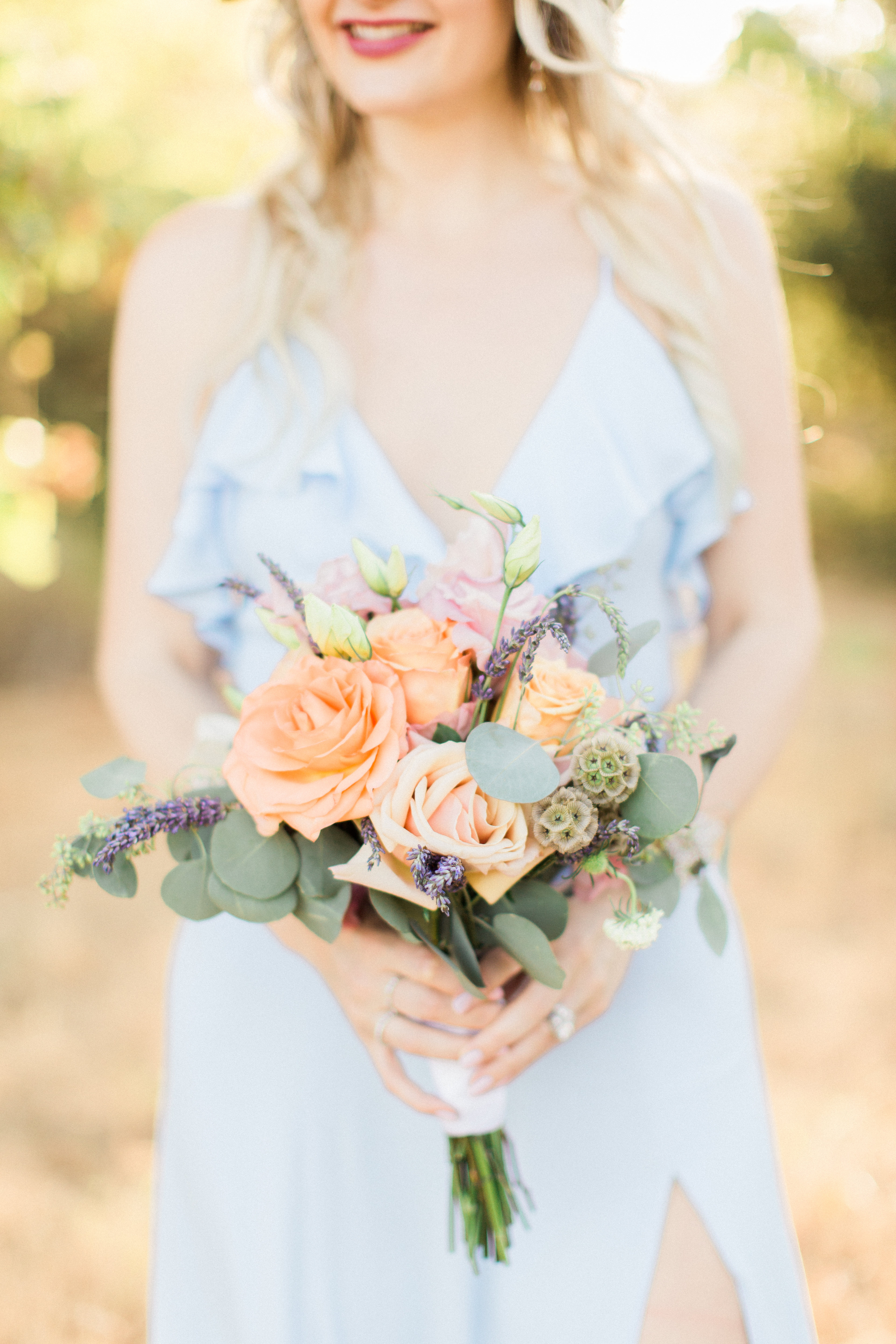 Colorful bohemian bouquet by with eucalyptus. 
