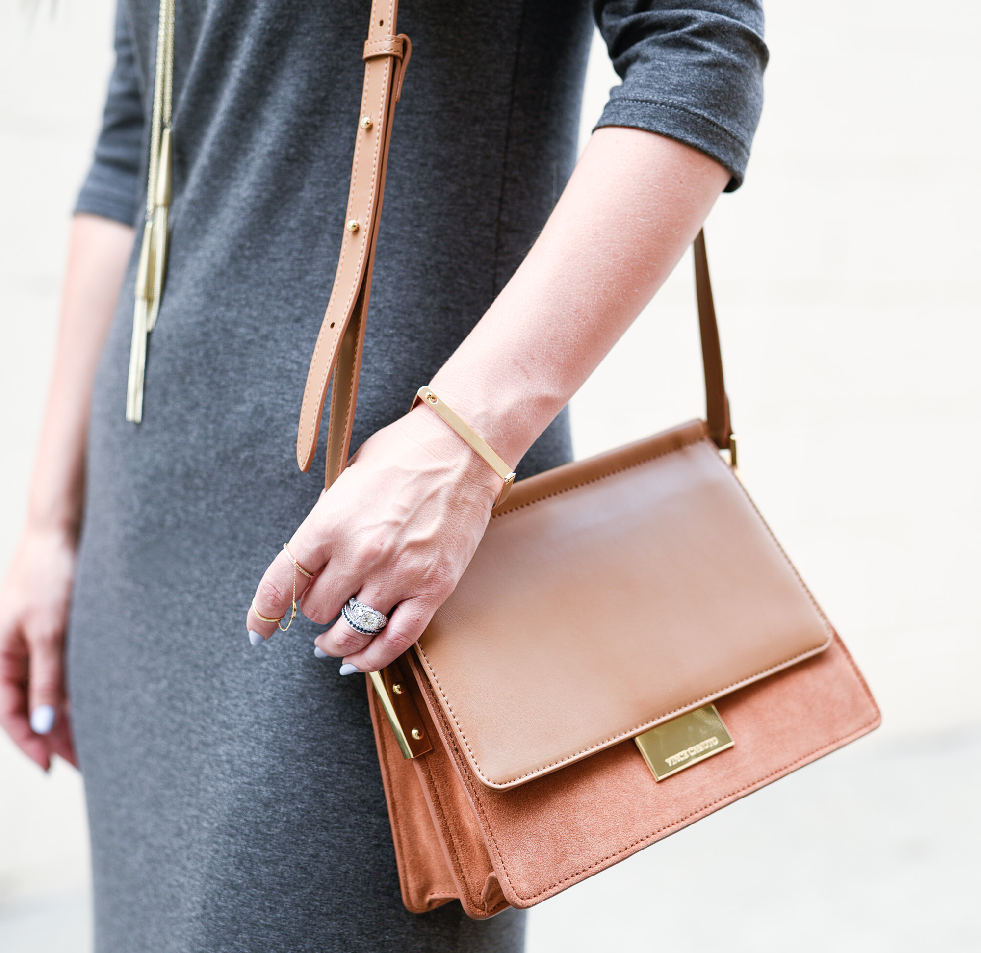 Two toned tan crossbody bag. 