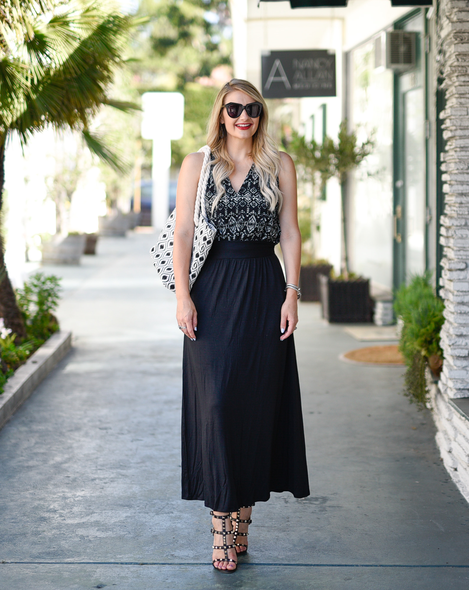 Black skirt and a printed aztec top. 