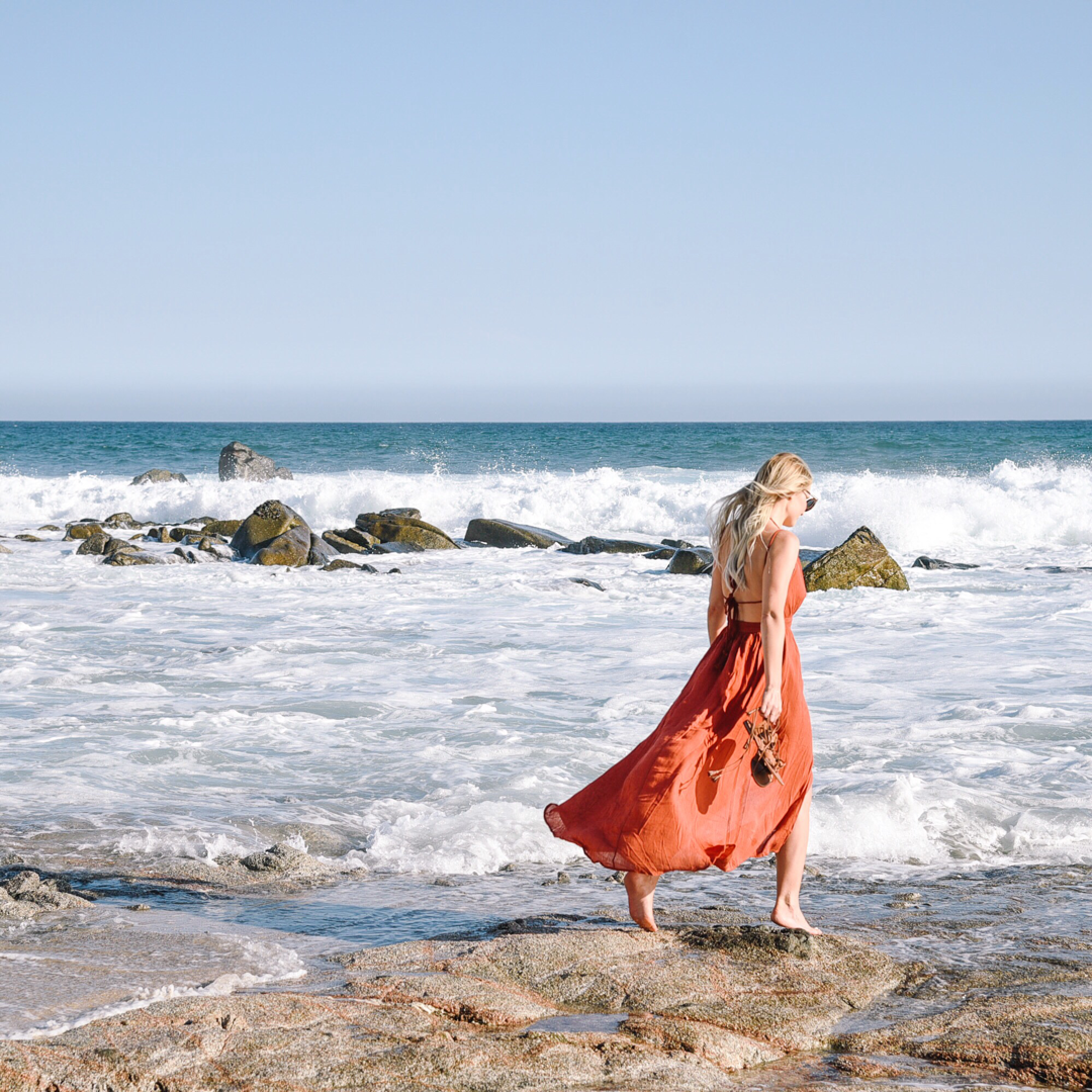 Burnt orange flowy maxi dress on the pacific ocean. Hoping this beauty is in the Nordstrom Anniversary Sale! 