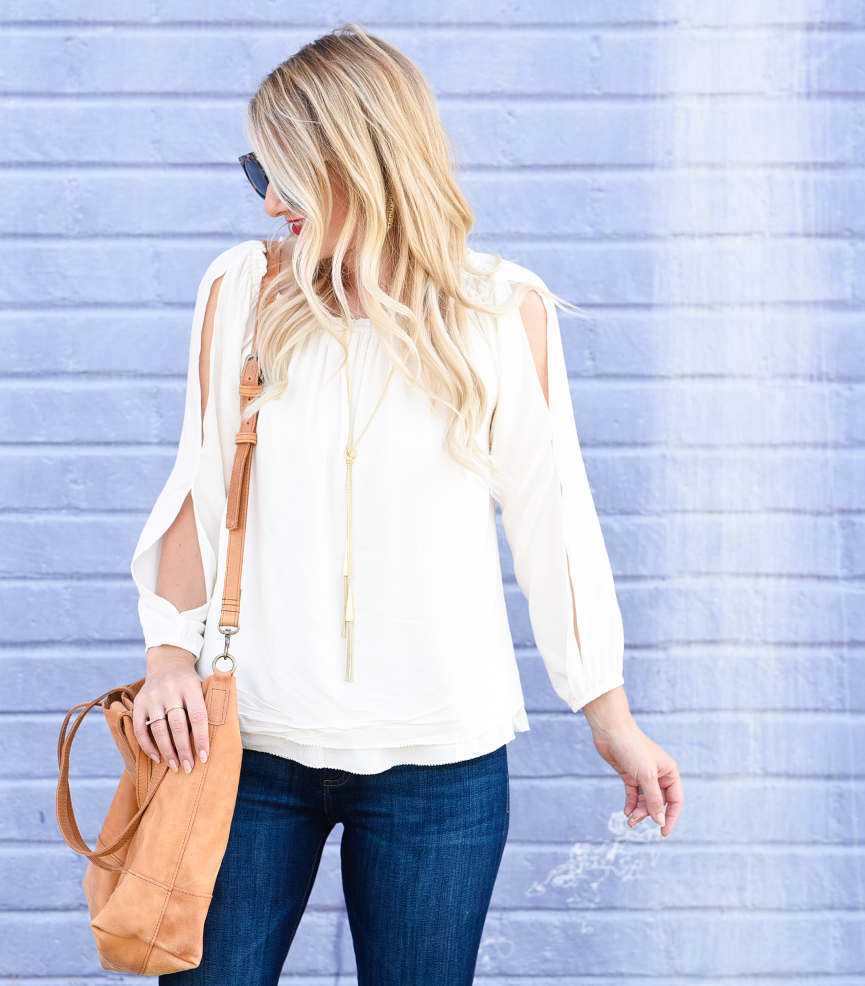 A romantic white cold shoulder top! Love this blue wall! 