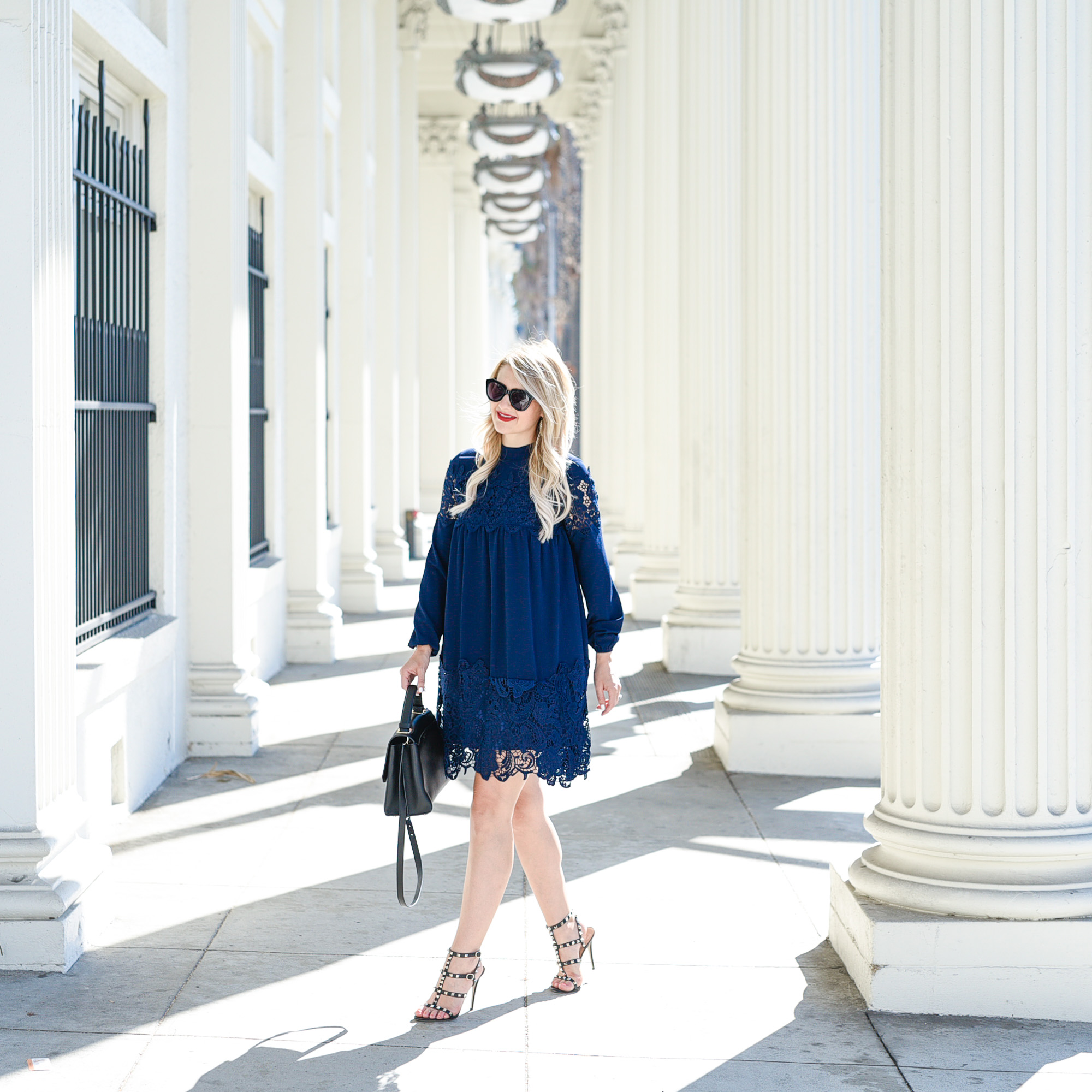 Jenna Colgrove in an long sleeved ASOS Smock Dress in navy lace. 