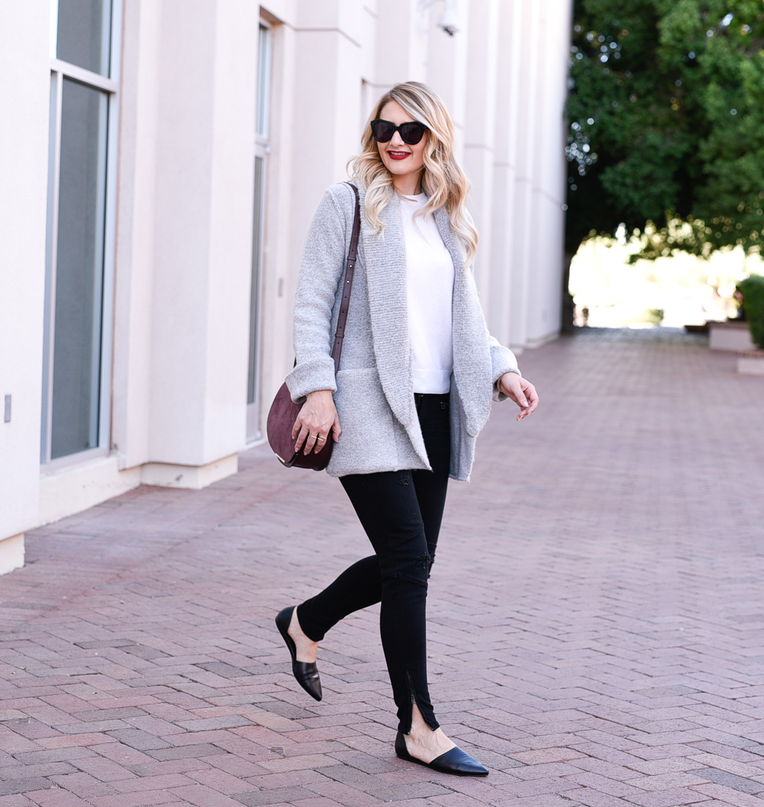 Jenna Colgrove's fall style with a Jenni Kayne cashmere ivory sweater, Cult of Indivituality distressed skinny jeans, and Jenni Kayne black D'Orsay flats. 