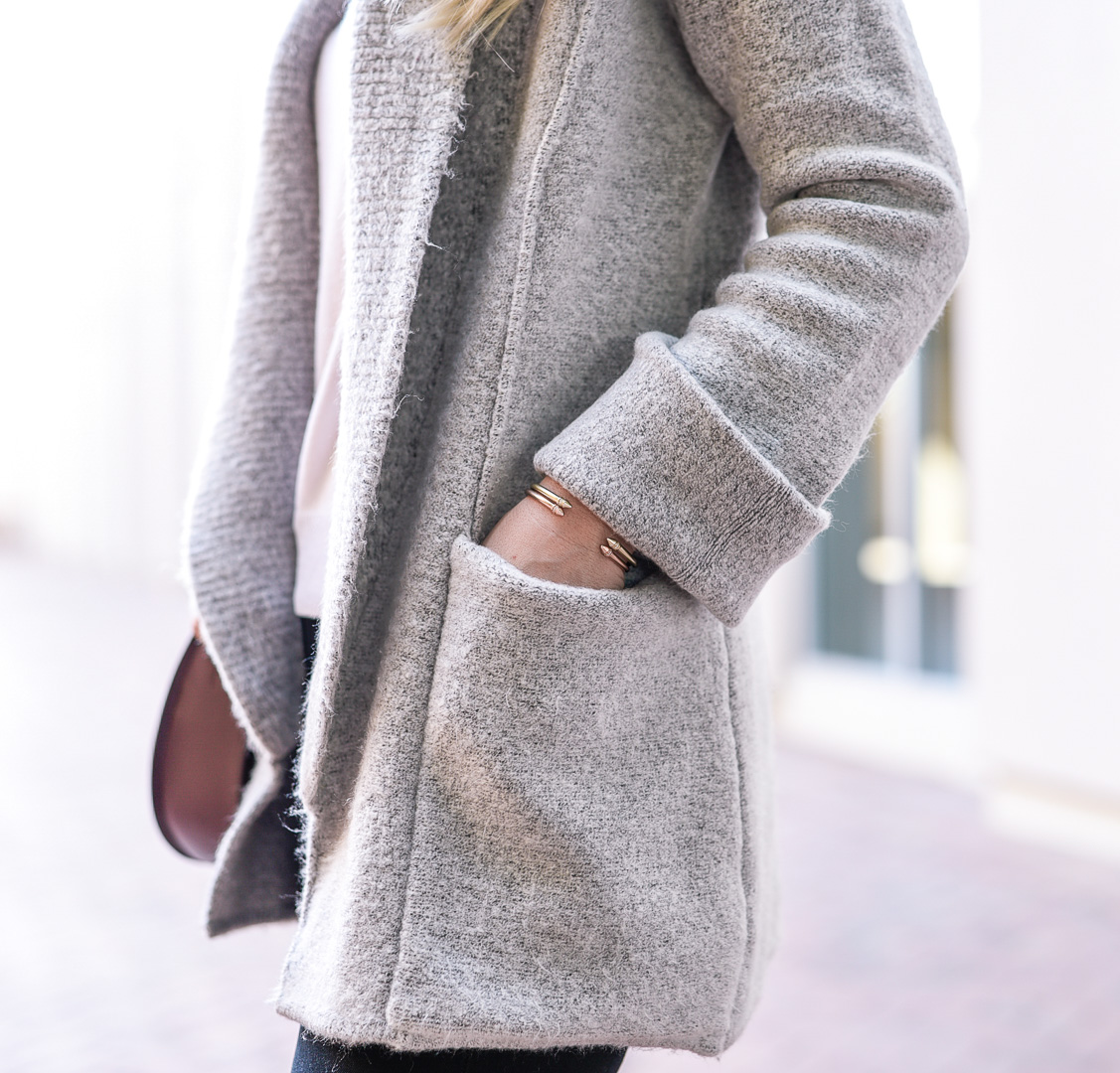 Jenna Colgrove wearing the Gentle Fawn Cardinal Cardigan in Grey.