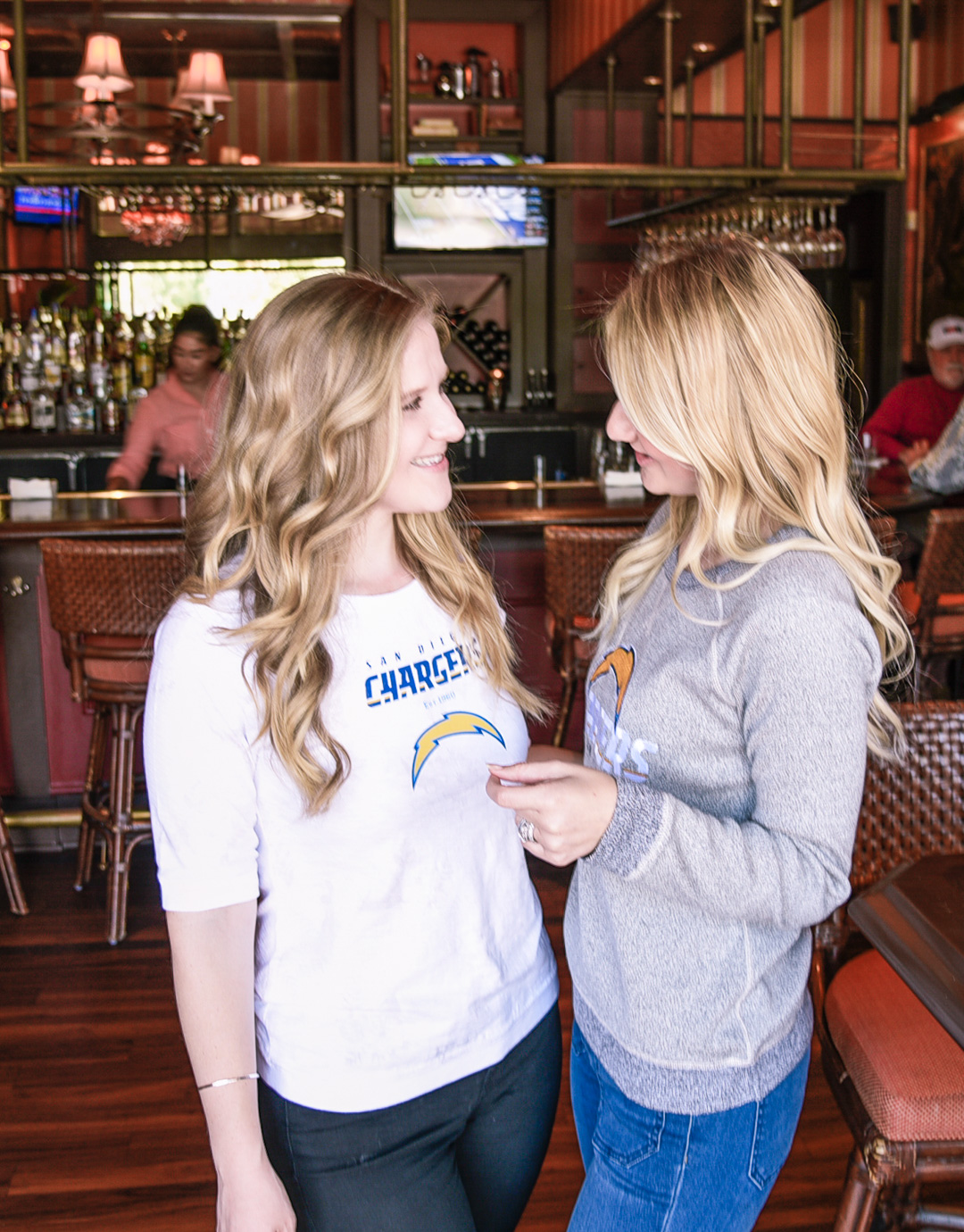 Sisters wearing Tommy Bahama for NFL gear - it's football season! 