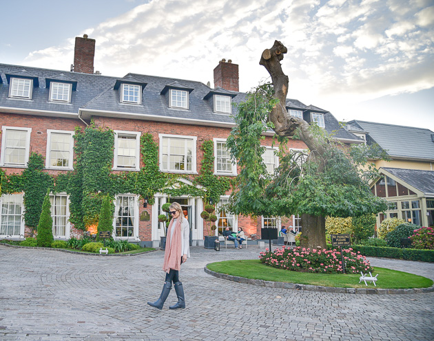 Jenna Colgrove outside of Hayfield Manor in Cork, Ireland wearing Hunter Boots in grey matte. 