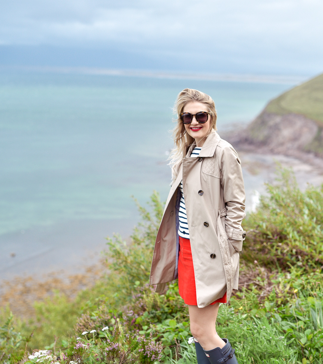 Jenna Colgrove in a red J.Crew corduroy mini skirt in the Ring of Kerry, Ireland. 