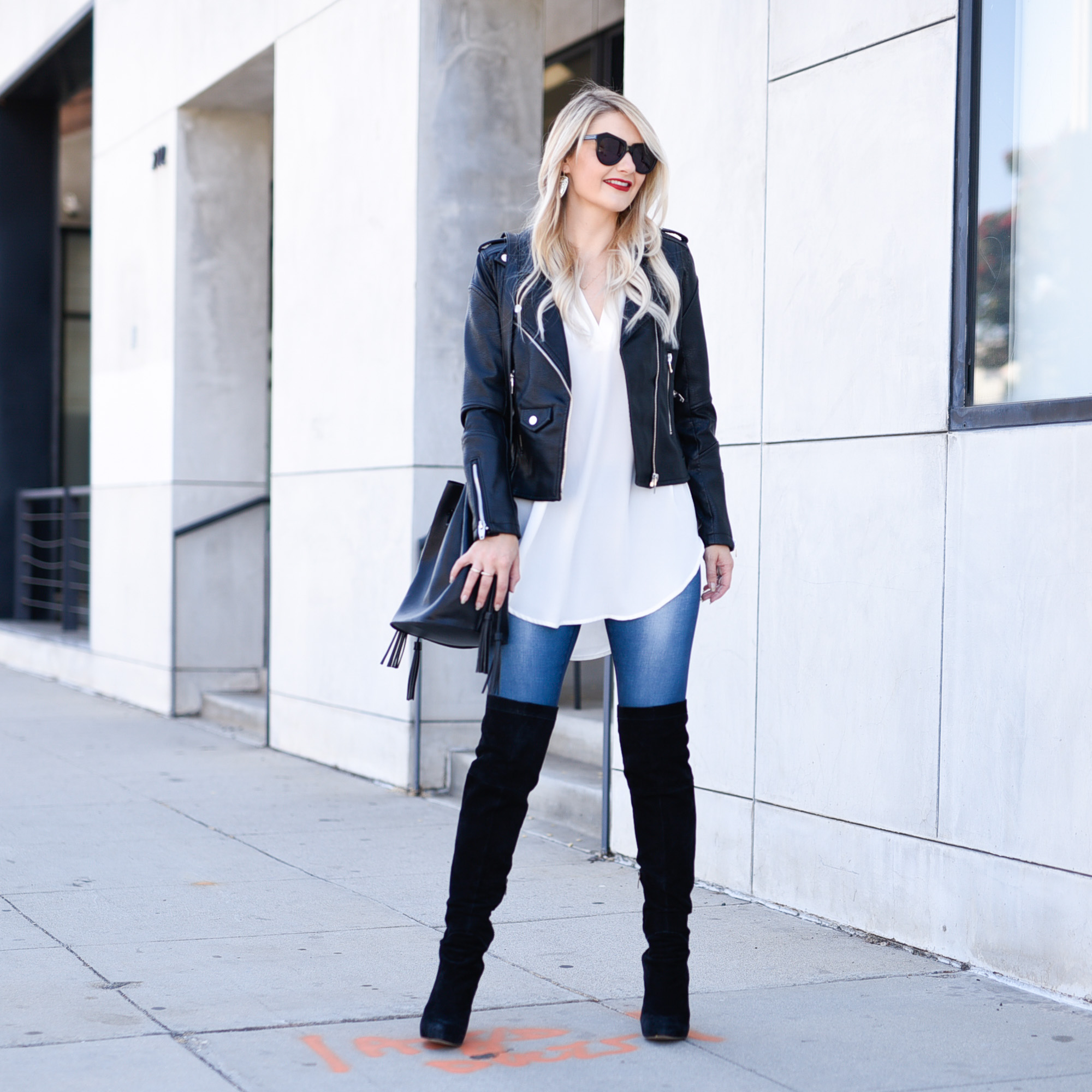 Jenna Colgrove in the Lucy Activewear indiGO leggings and Blank NYC moto jacket. 