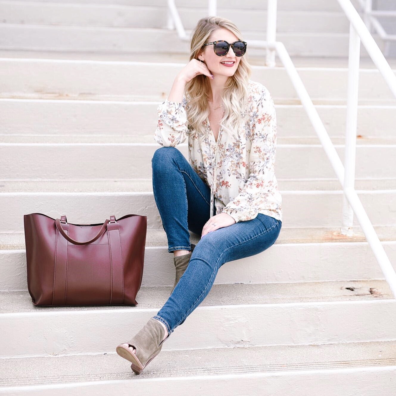 Jenna Colgrove wearing the WAYF floral peasant top and Vince Camute Kathleen booties.