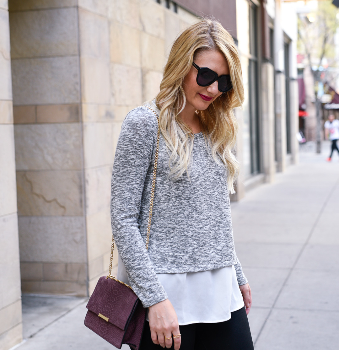 Jenna Colgrove wearing the perfect crewneck sweater with pleats in the back. 