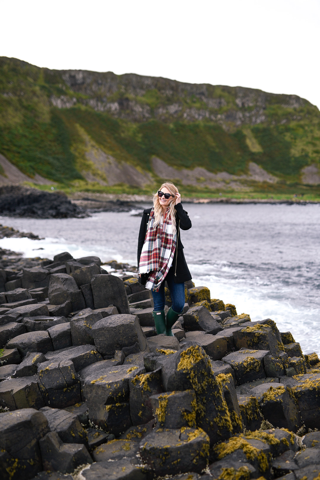 Jenna Colgrove traveling in Northern Ireland at the basalt columns. 