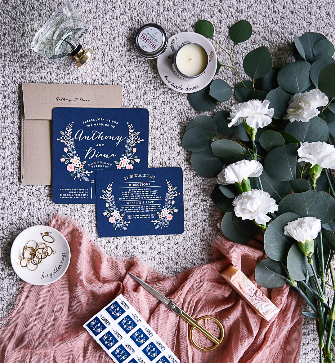 Pretty bohemian themed wedding invitations in navy and pink. 