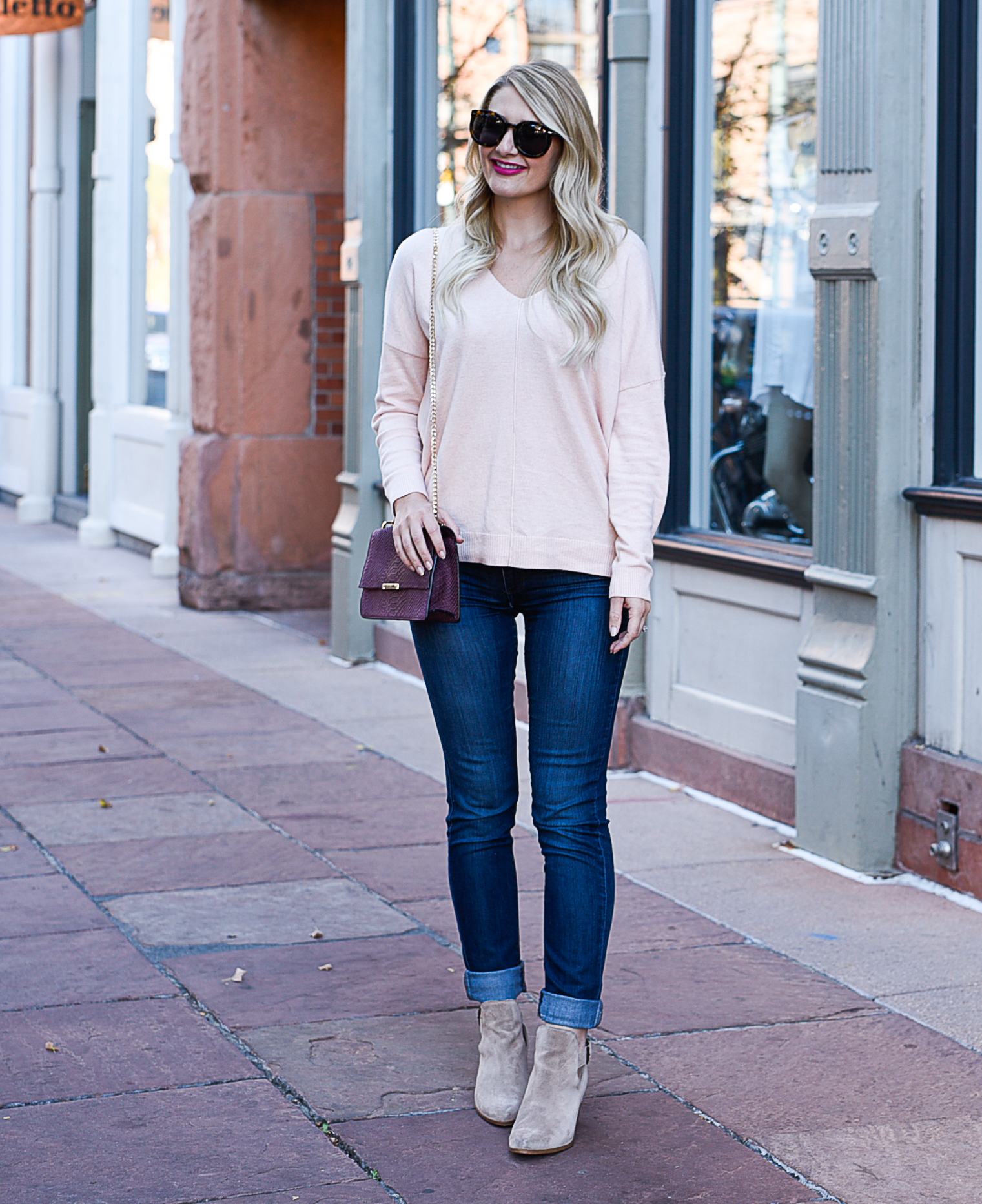 Jenna Colgrove wearing a Leith oversized blush pink sweater and Sole Society beige booties. 