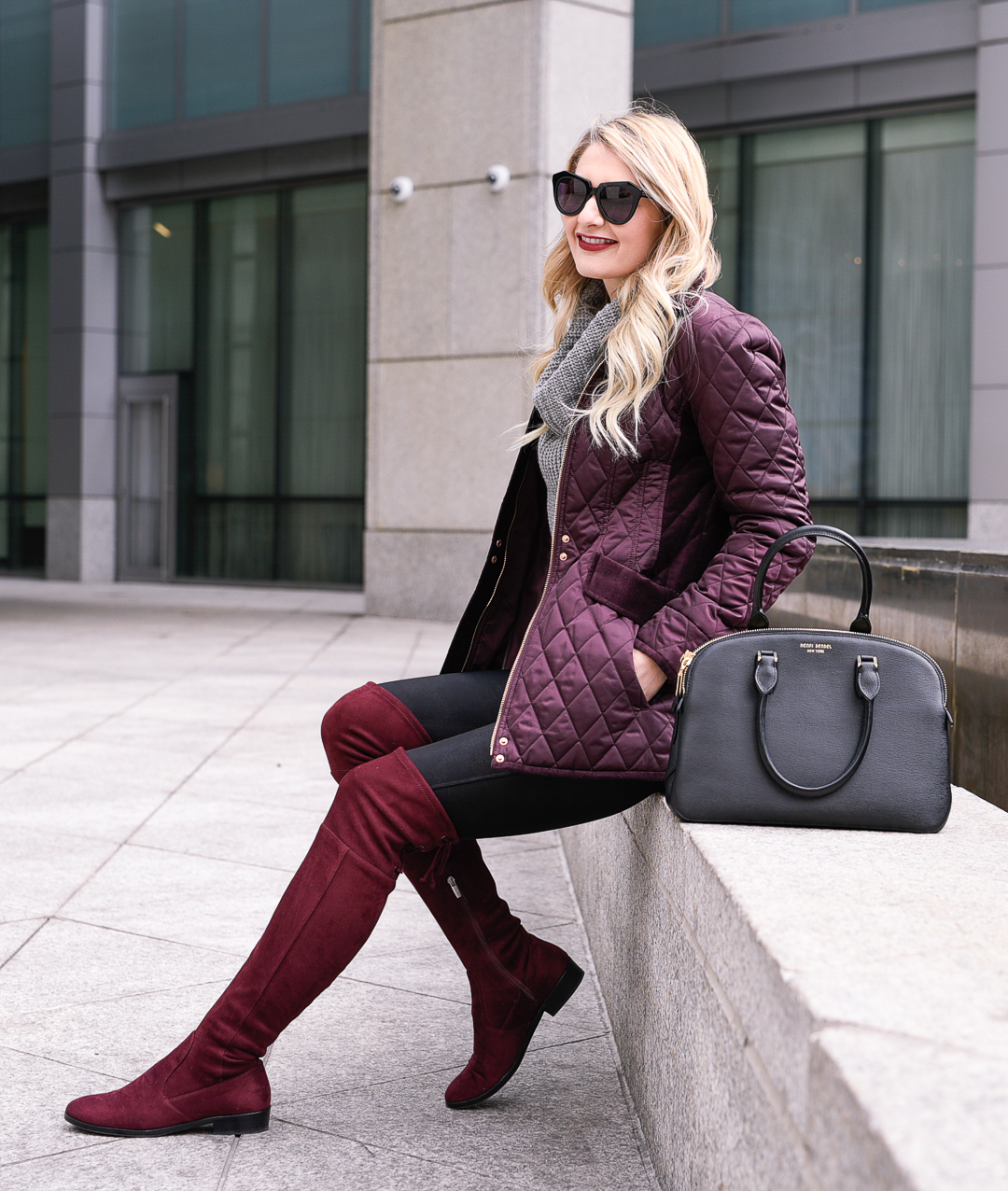A cozy winter outfit with burgundy accents in suede and velvet.
