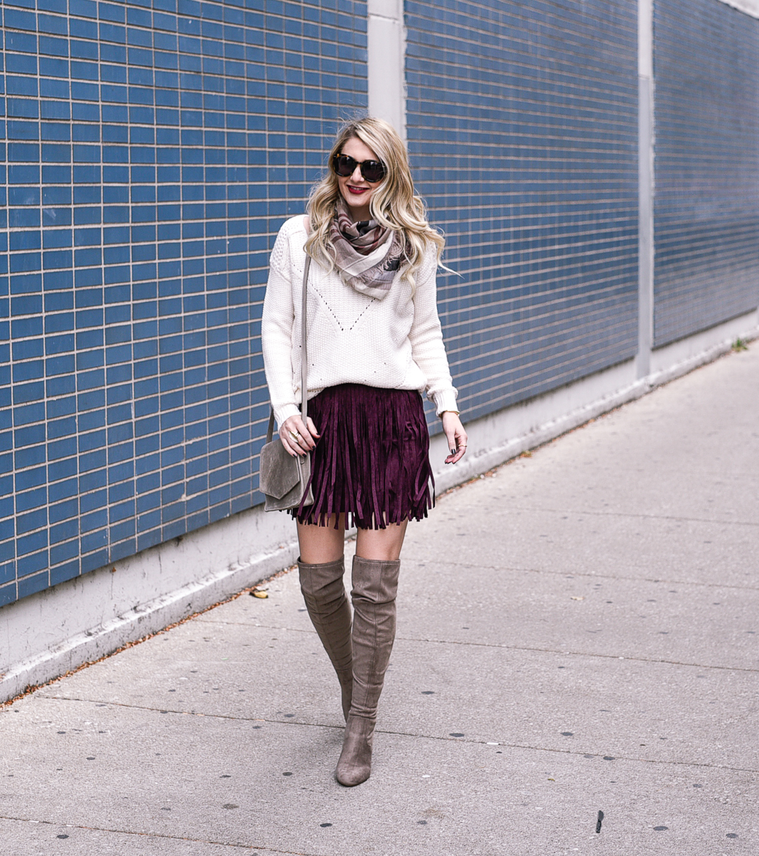 Visions of Vogue wearing a fall look: cozy knits and fringe. 