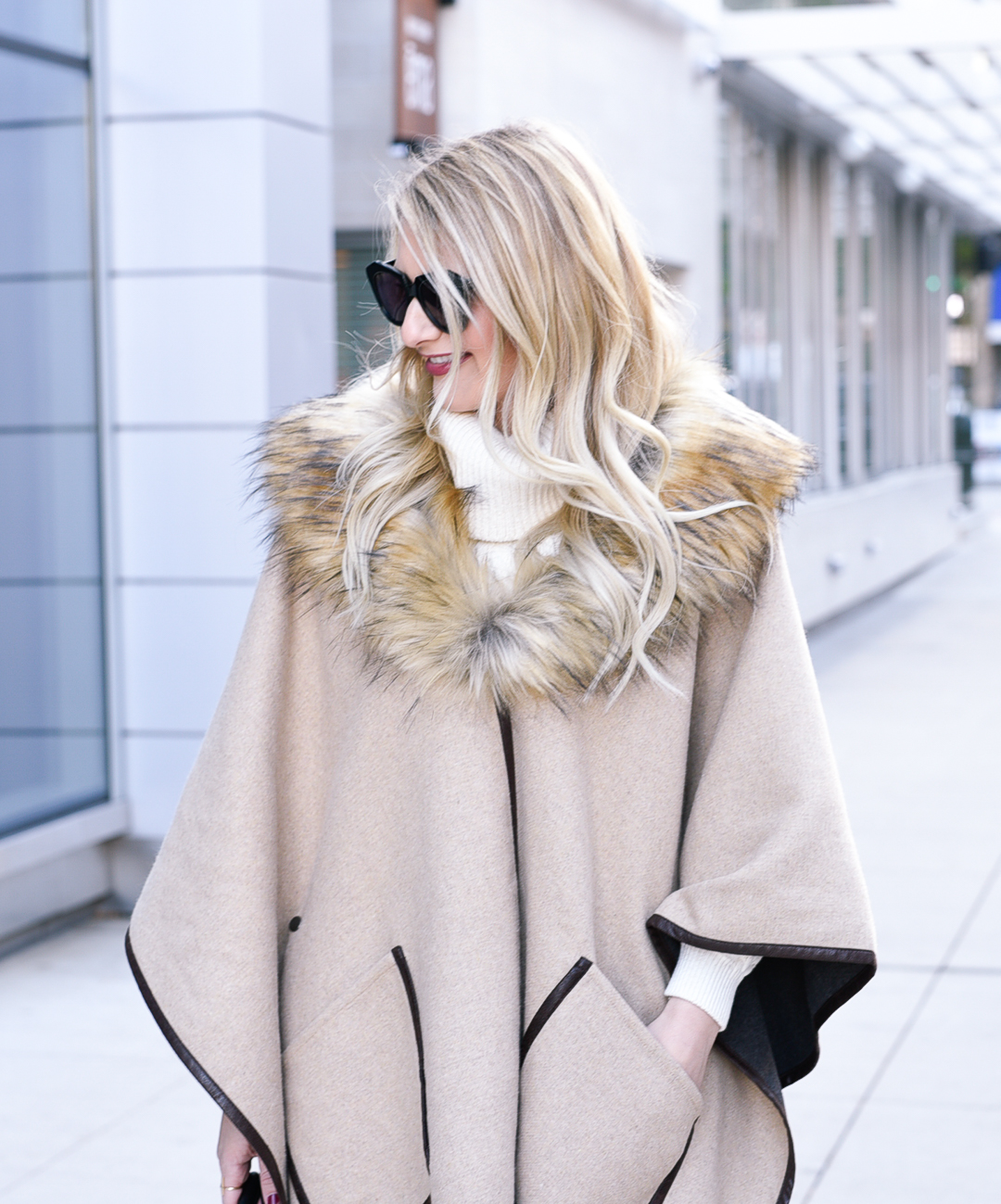 Jenna Colgrove's blonde wand curls and a faux fur collar! 