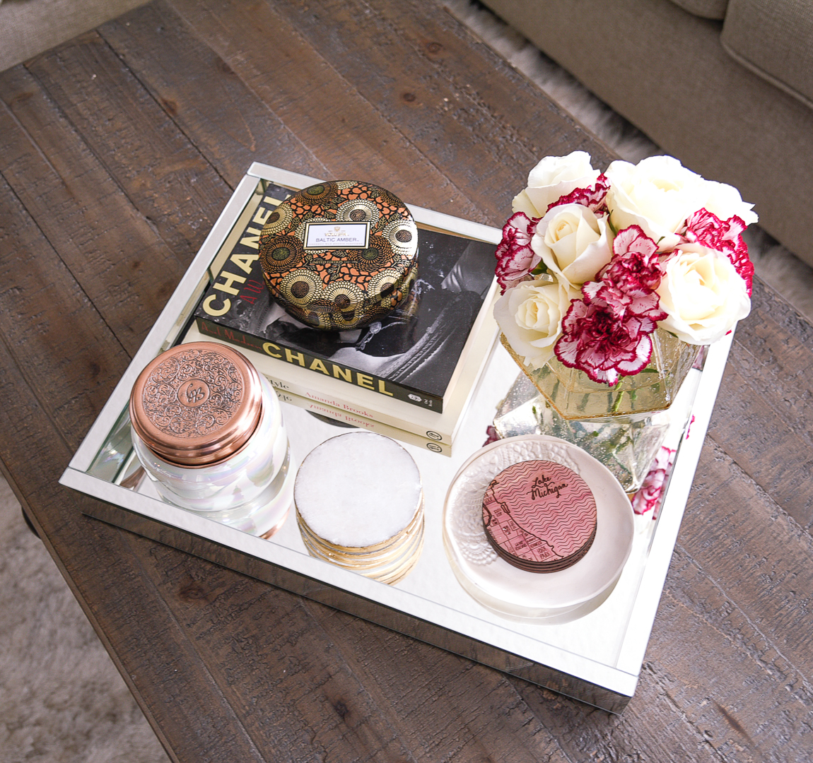 The west elm mirrored tray with Chicago themed wood coasters from Uncommon Goods. 