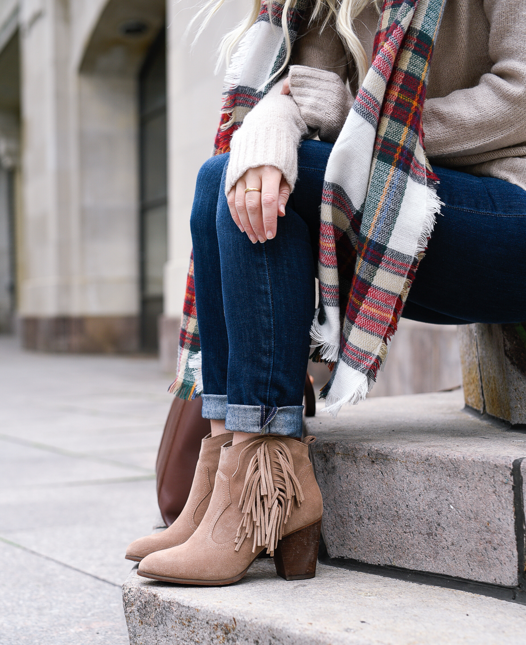 Fringe booties and a plaid scarf.