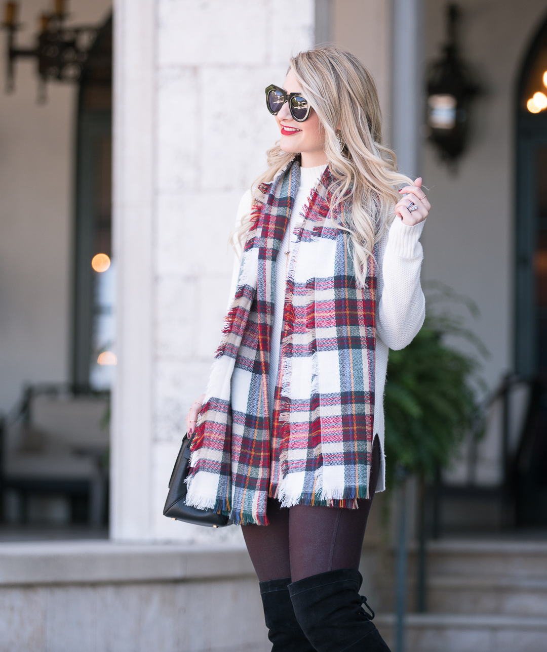 Jenna Colgrove wearing a Shiraleah plaid scarf and Halogen Mock Neck sweater. 