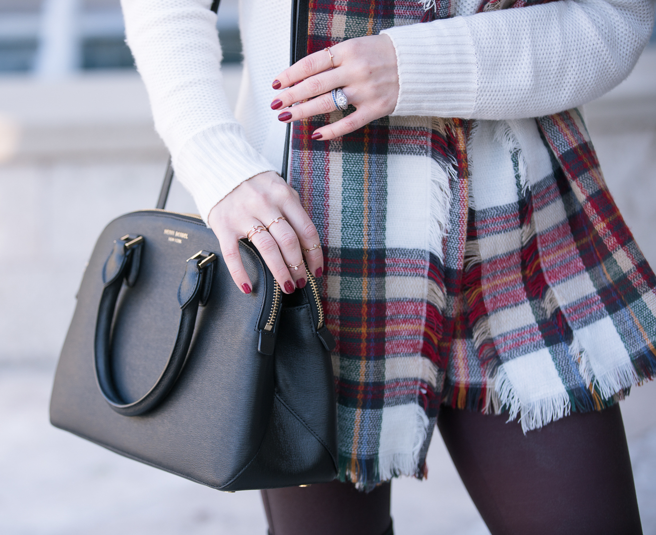 Jenna Colgrove wearing the Henri Bendel West 57th Satchel in black leather.