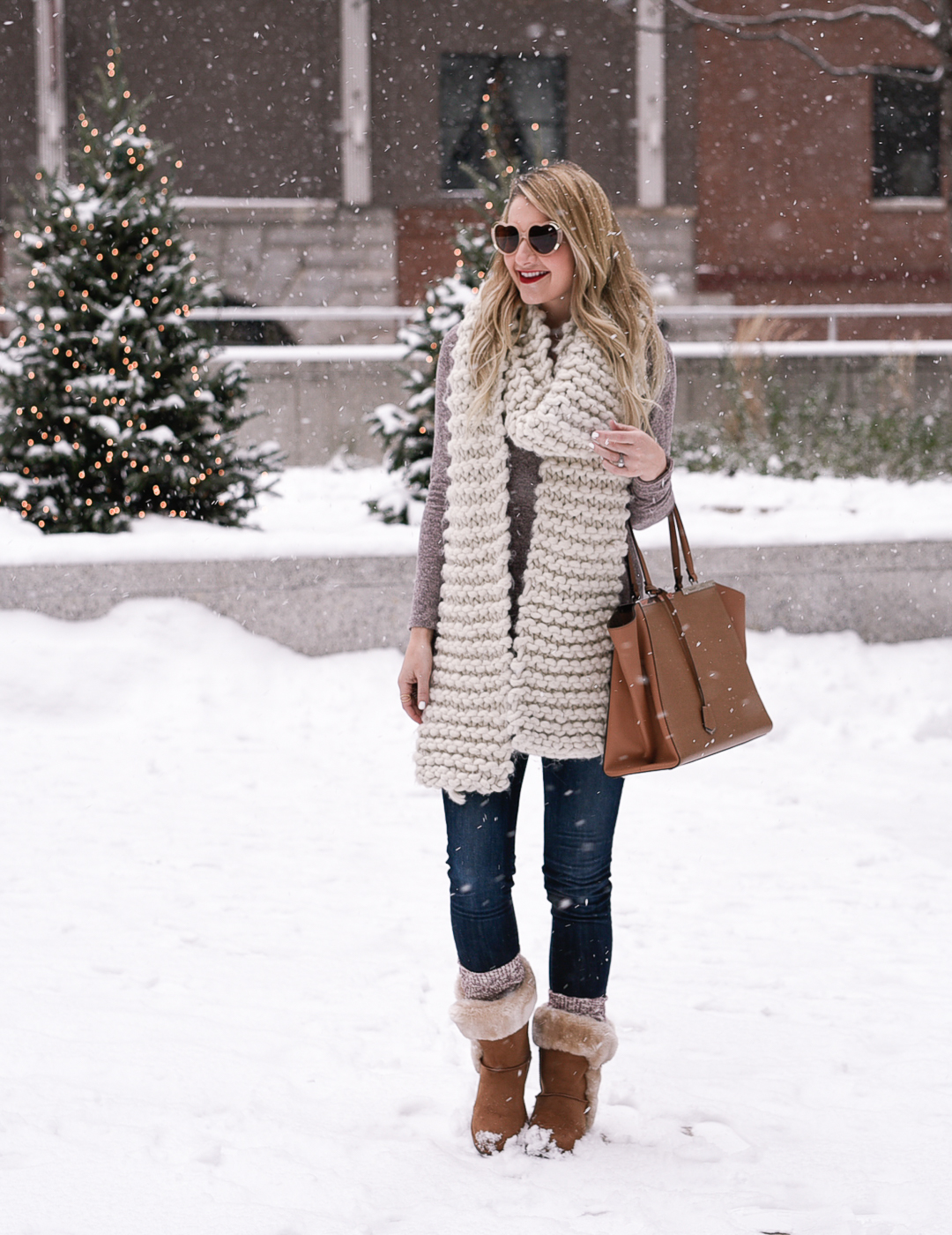 Cozy snow day look with a white knit scarf. 