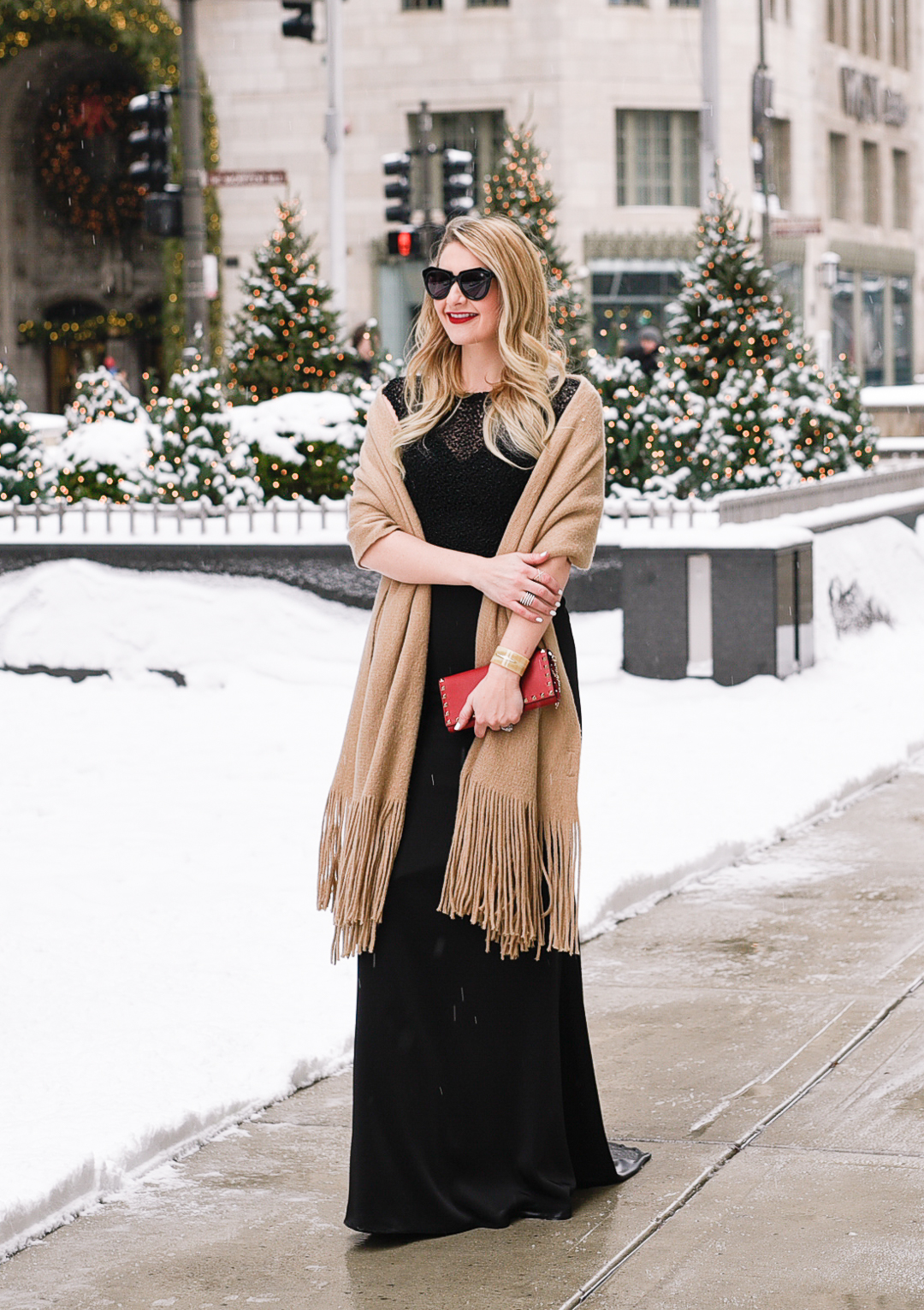 Jenna Colgrove in a floor length formal gown that is perfect for the holidays.