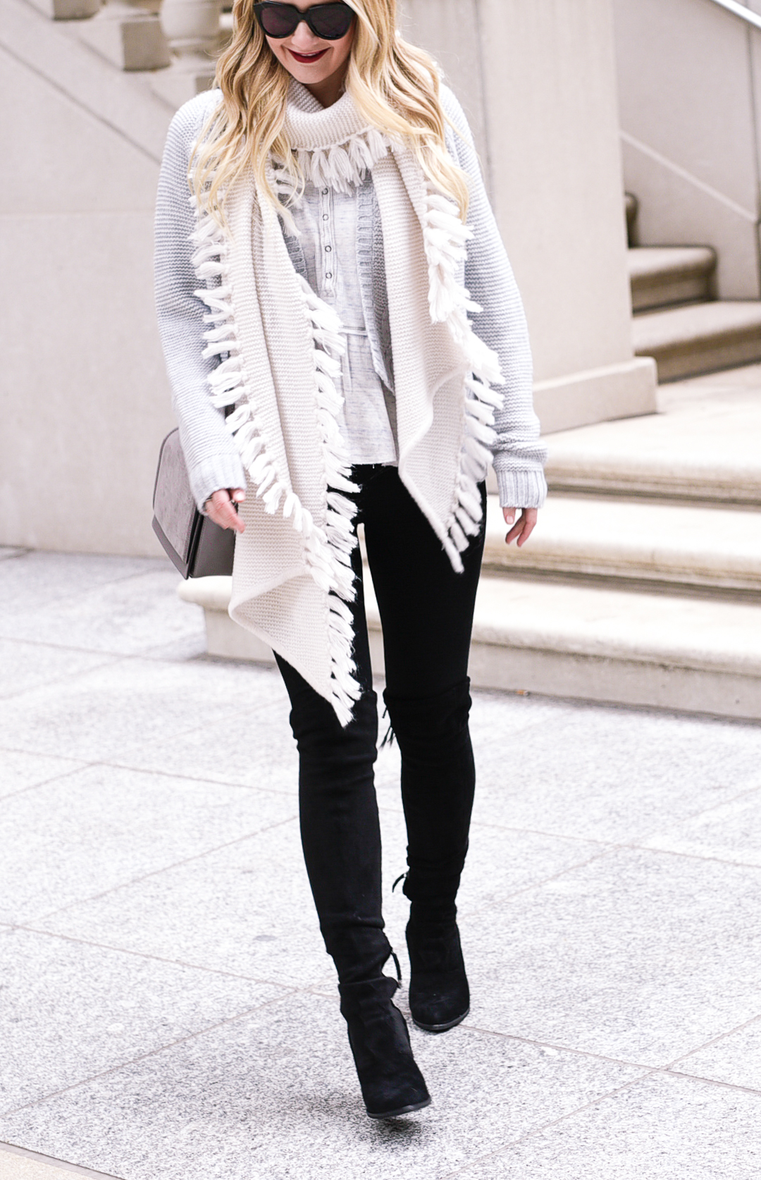 Flattering black leggings and suede boots. 