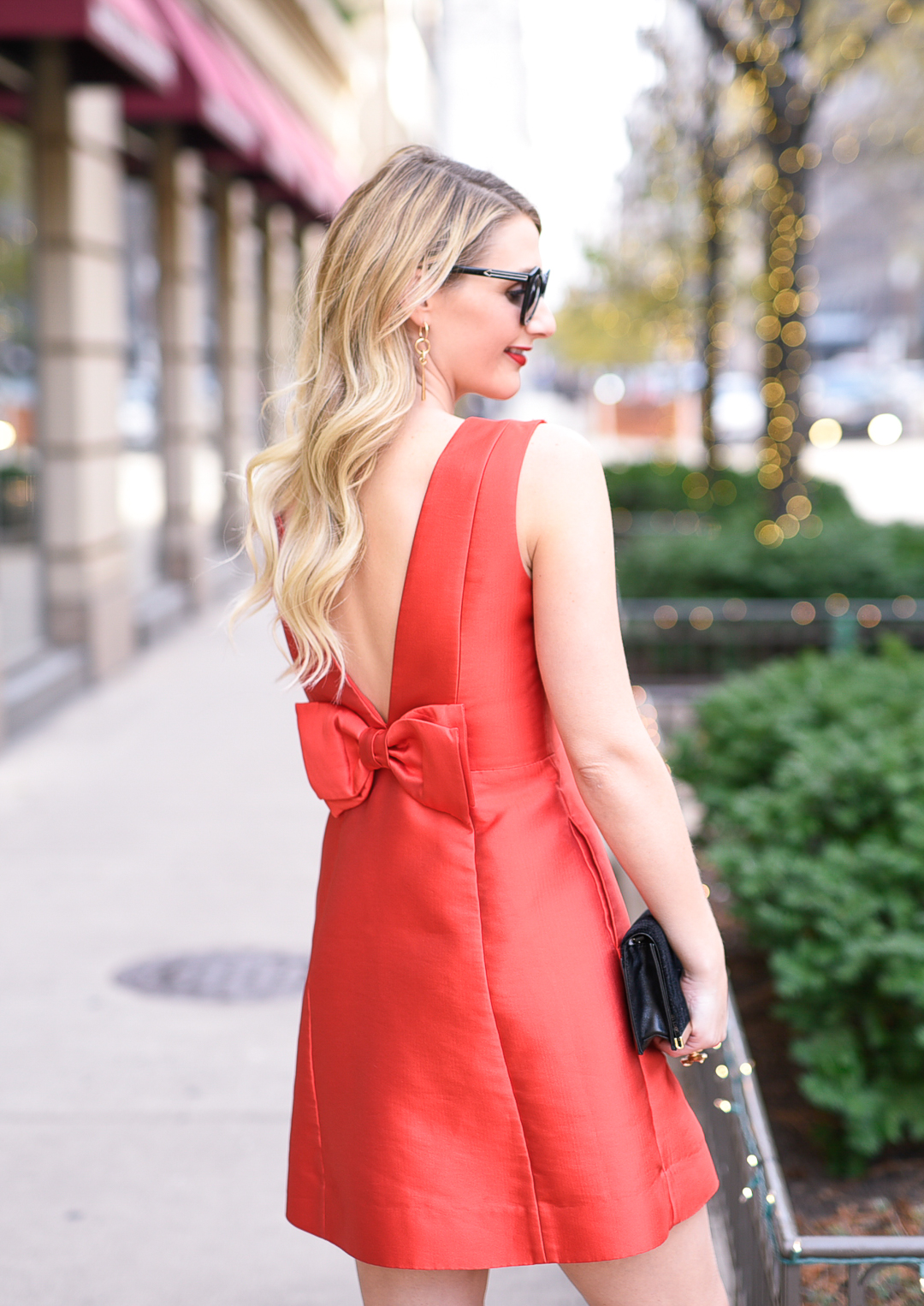The perfect red party dress with a bow on the back. 